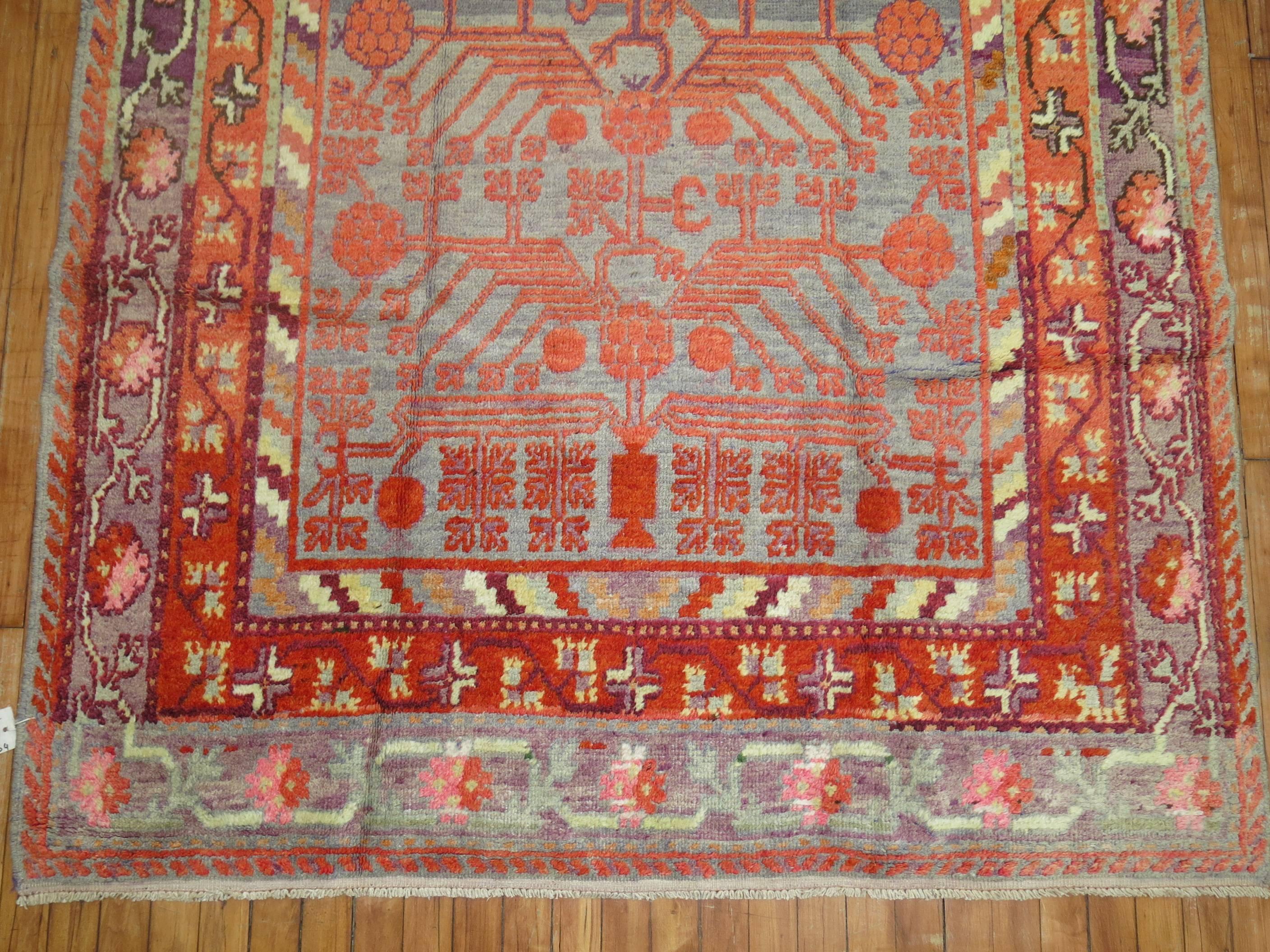 Early 20th Century Khotan Wool Gray Field Antique Pomegranate Rug In Excellent Condition For Sale In New York, NY
