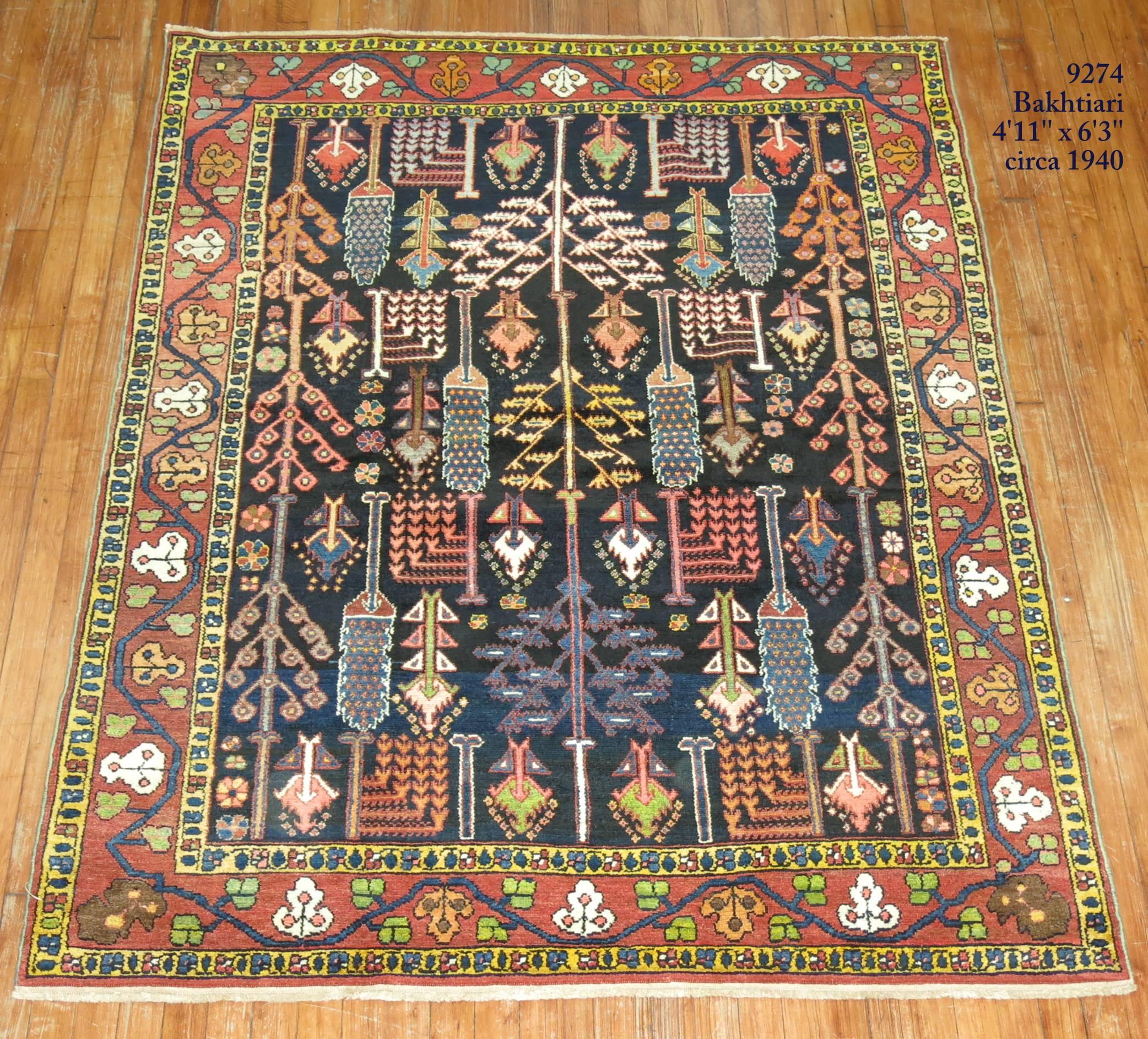 Stunning Persian Bakhtiari rug featuring a tree of life motif.