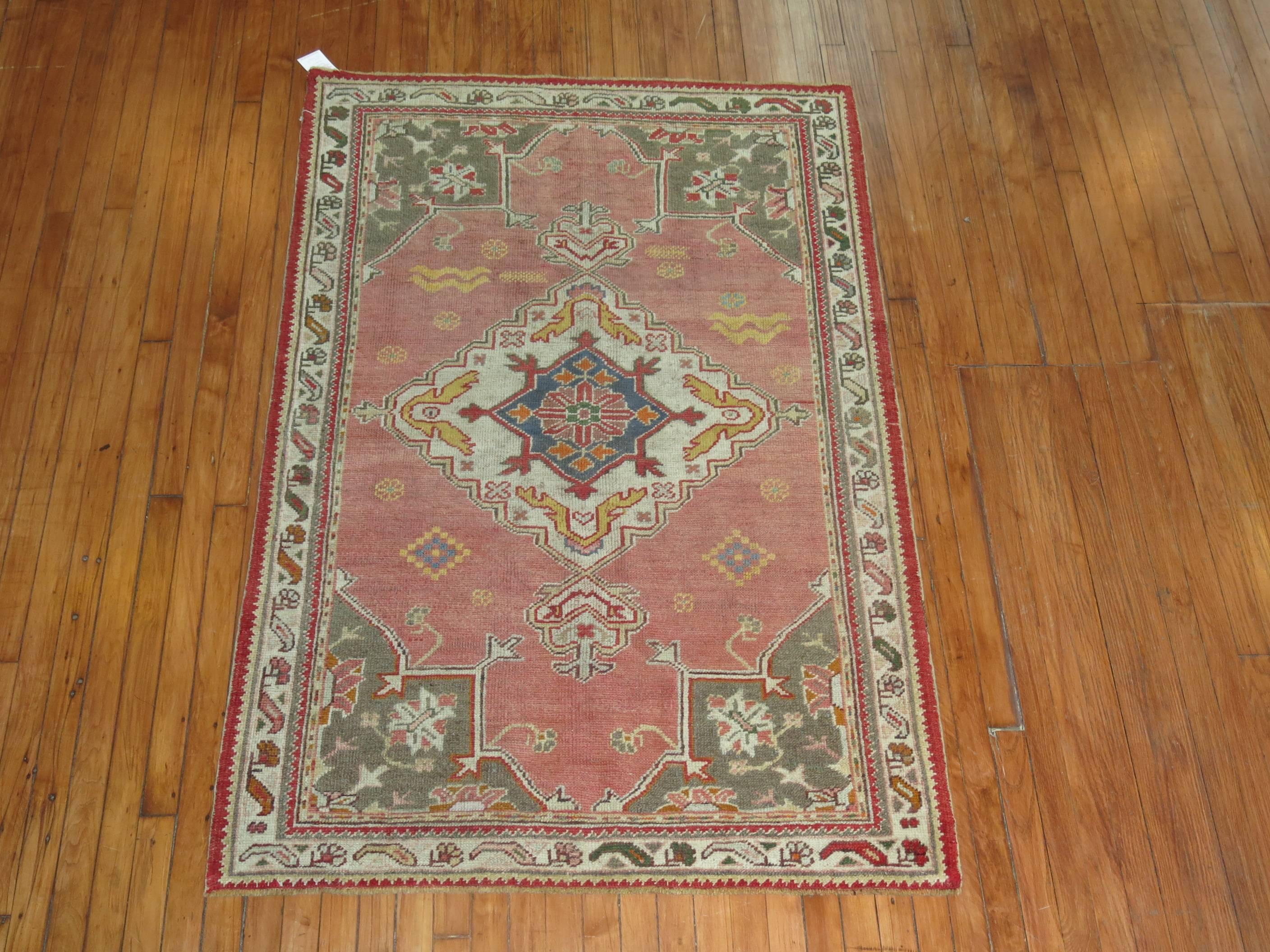 A vintage one of a kind turkish oushak rug.

3'10''x  5'11''