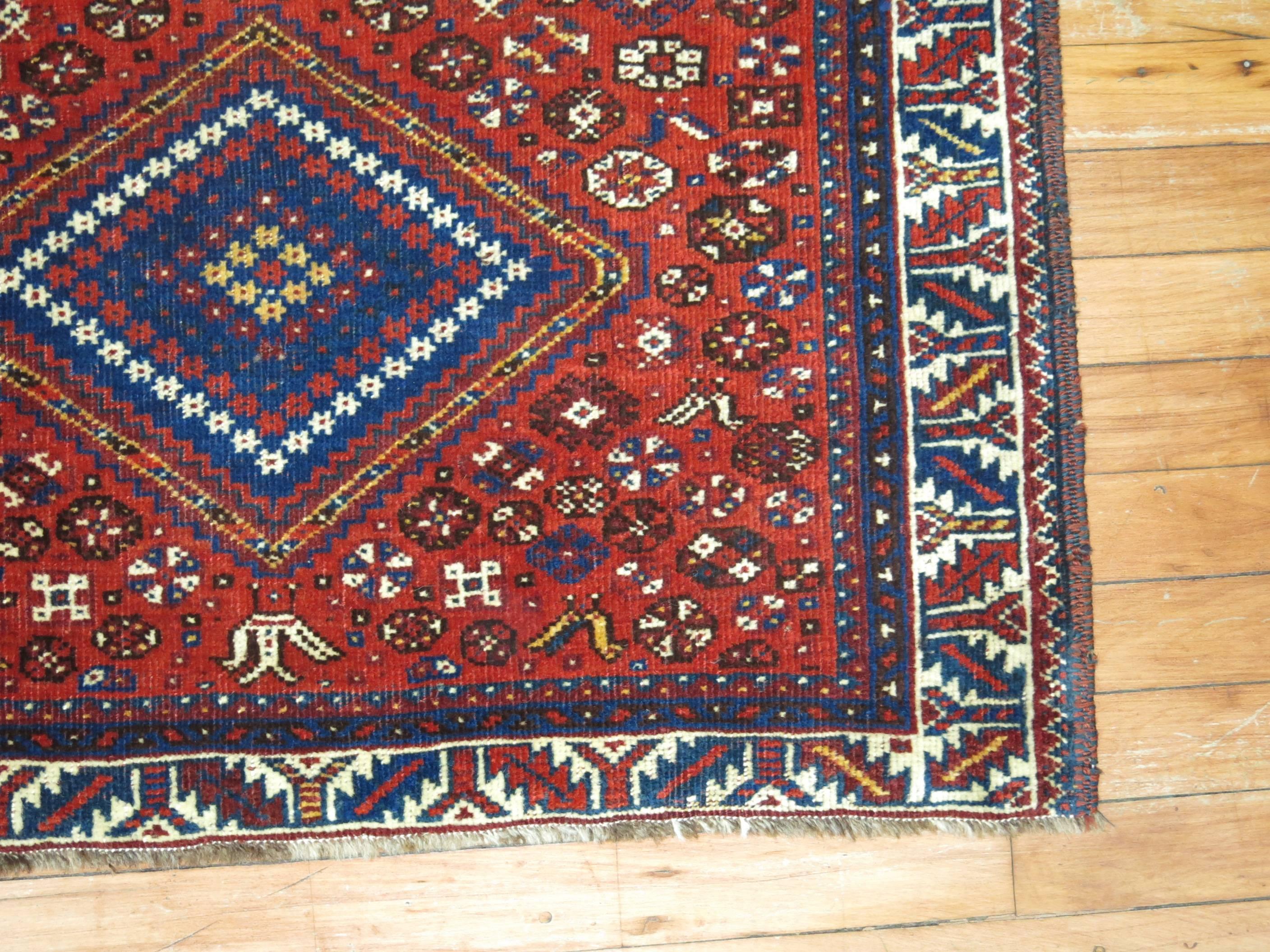 An antique Persian rug mat woven in city of Afshar in Northwest Persia,

circa 1930. Measures: 1'9