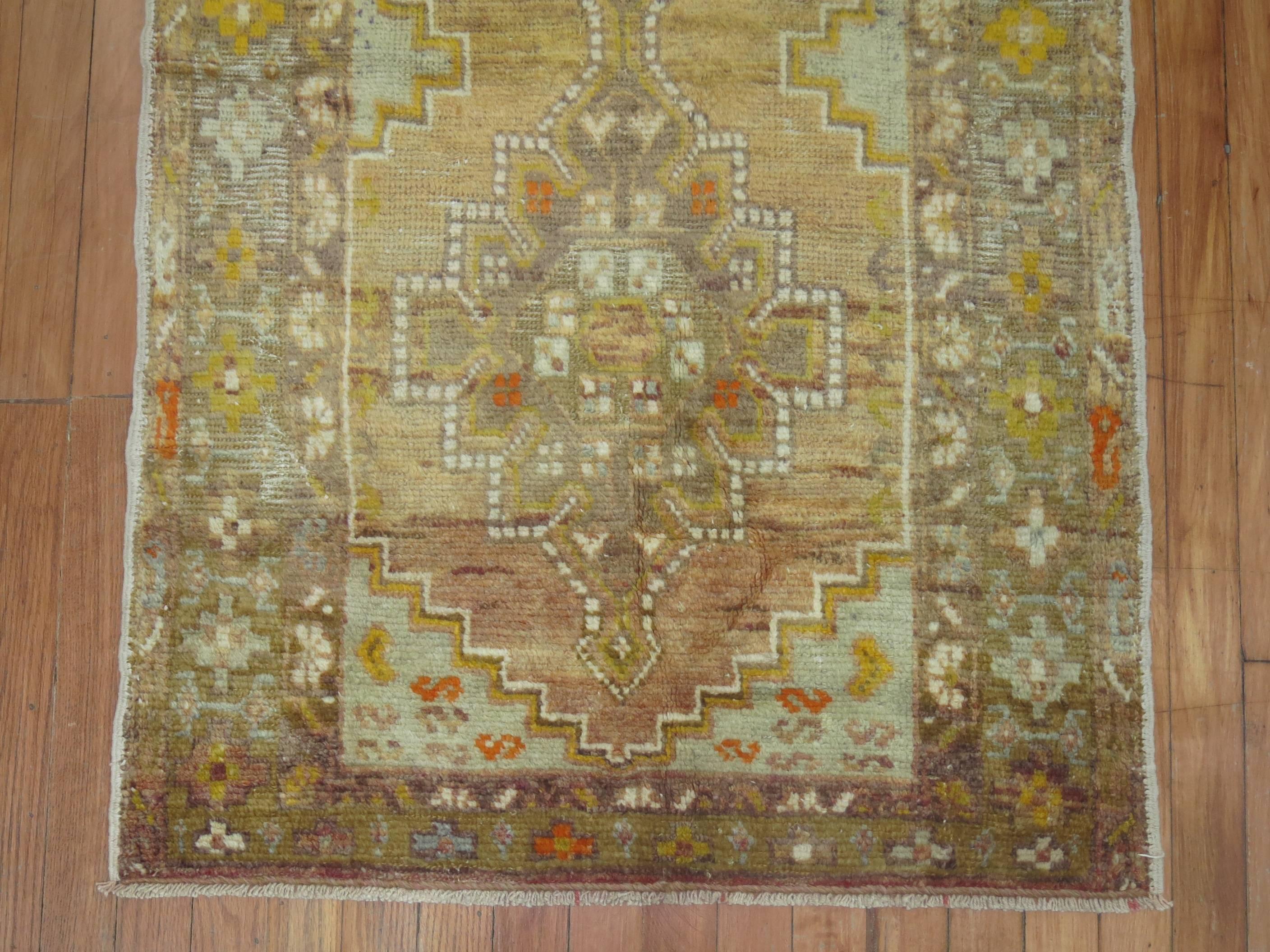 One of a kind vintage Turkish runner in gold, brown, beige and gray accents,

circa 1930s, measures: 2'7