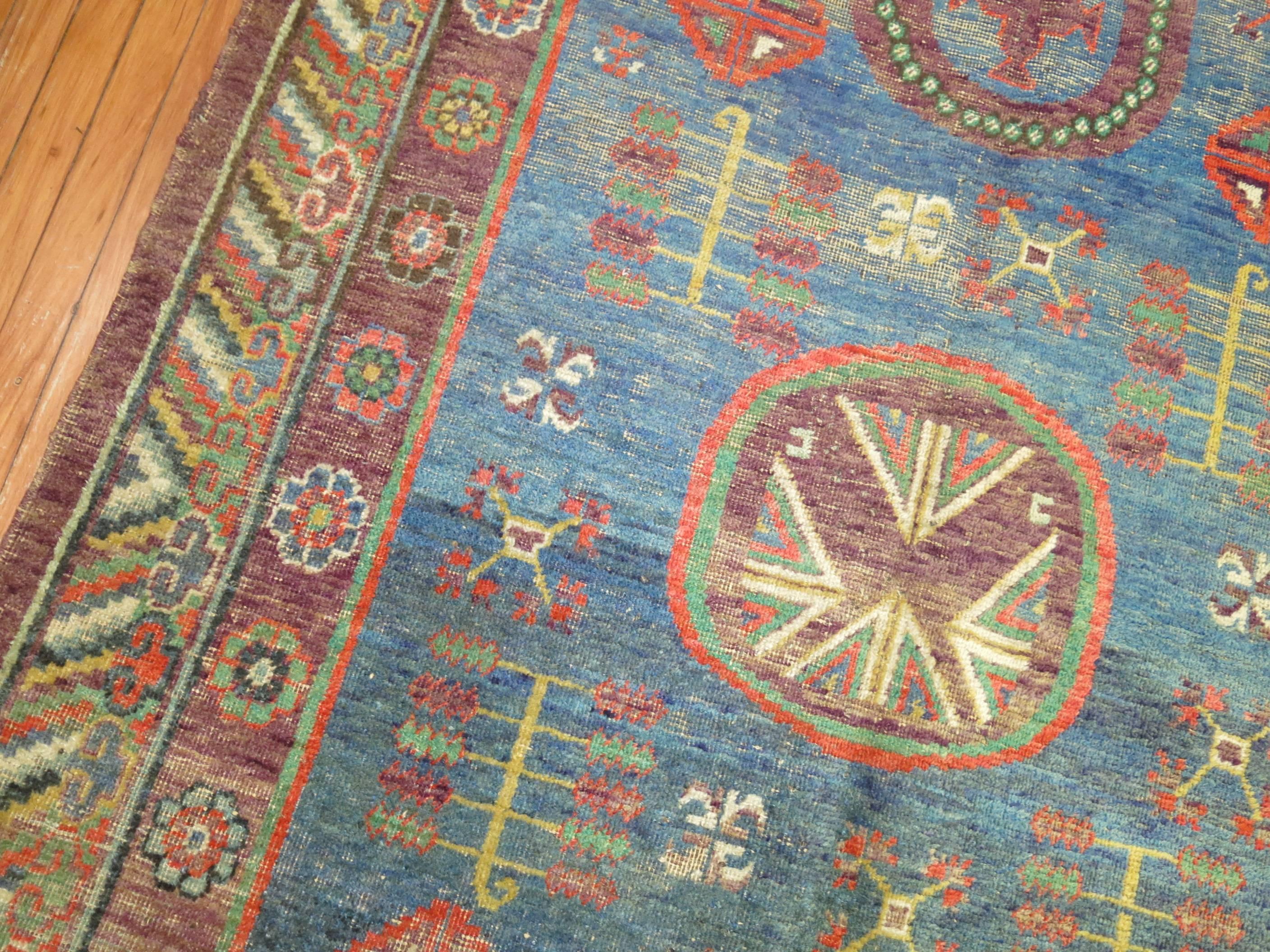 Whimisical Blue Early 20th Century Khotan Antique Rug For Sale 3