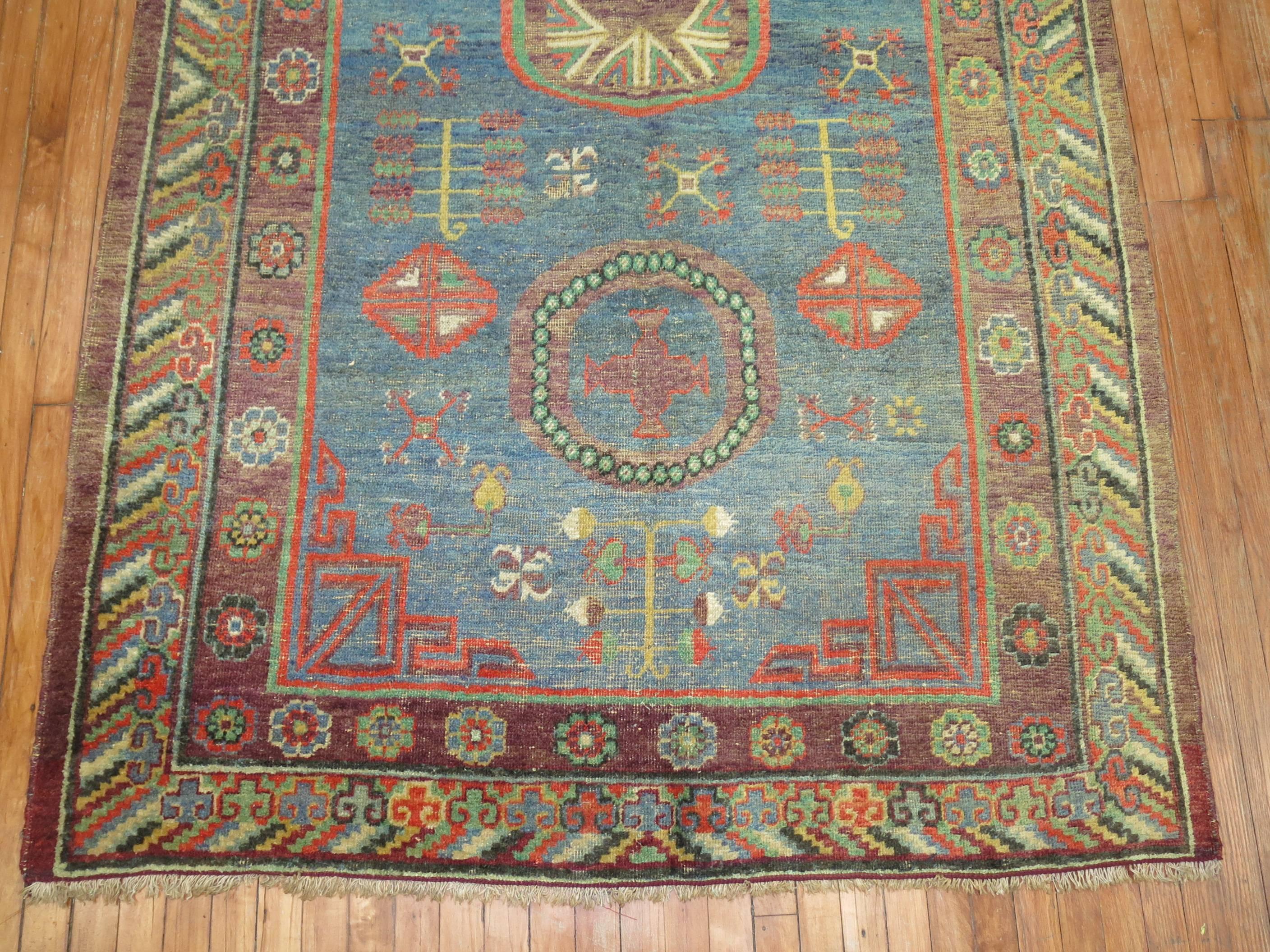 Whimisical Blue Early 20th Century Khotan Antique Rug For Sale 2