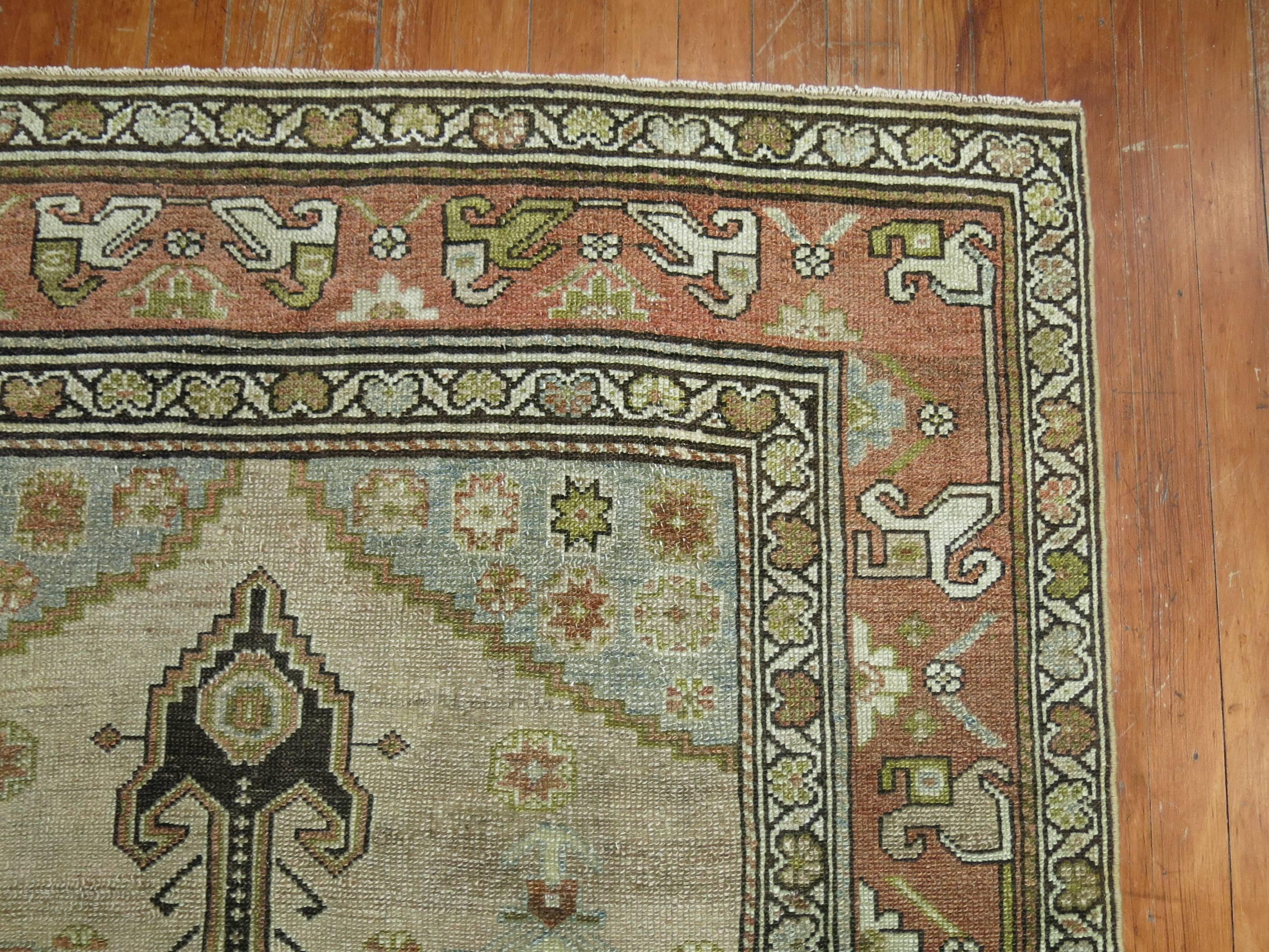 An early 20th century rare size Persian Malayer runner in earth tones.

Measures: 3'11