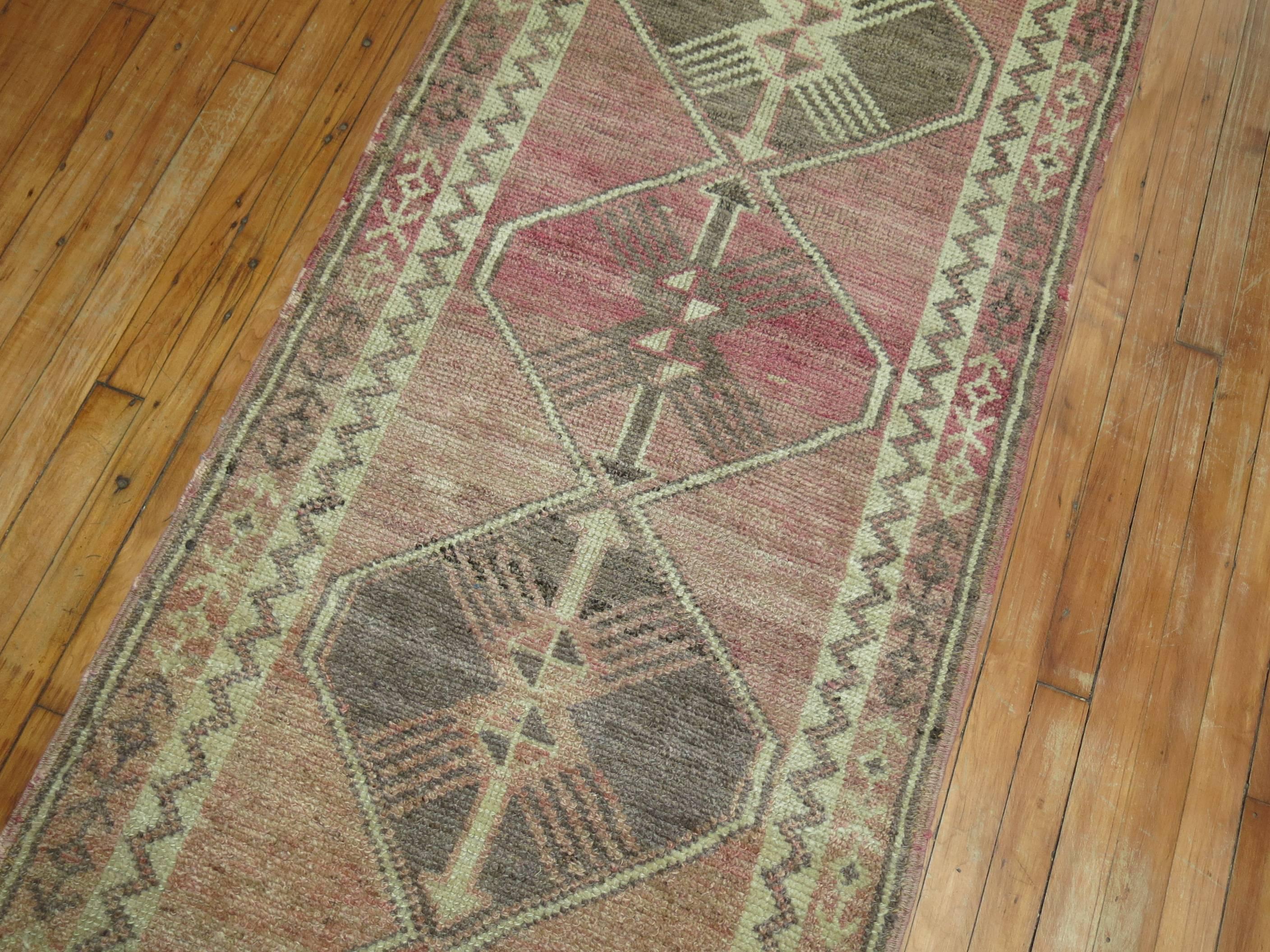 Vintage Turkish runner woven in Central Turkey in shades of pink and brown.

Measures: 29
