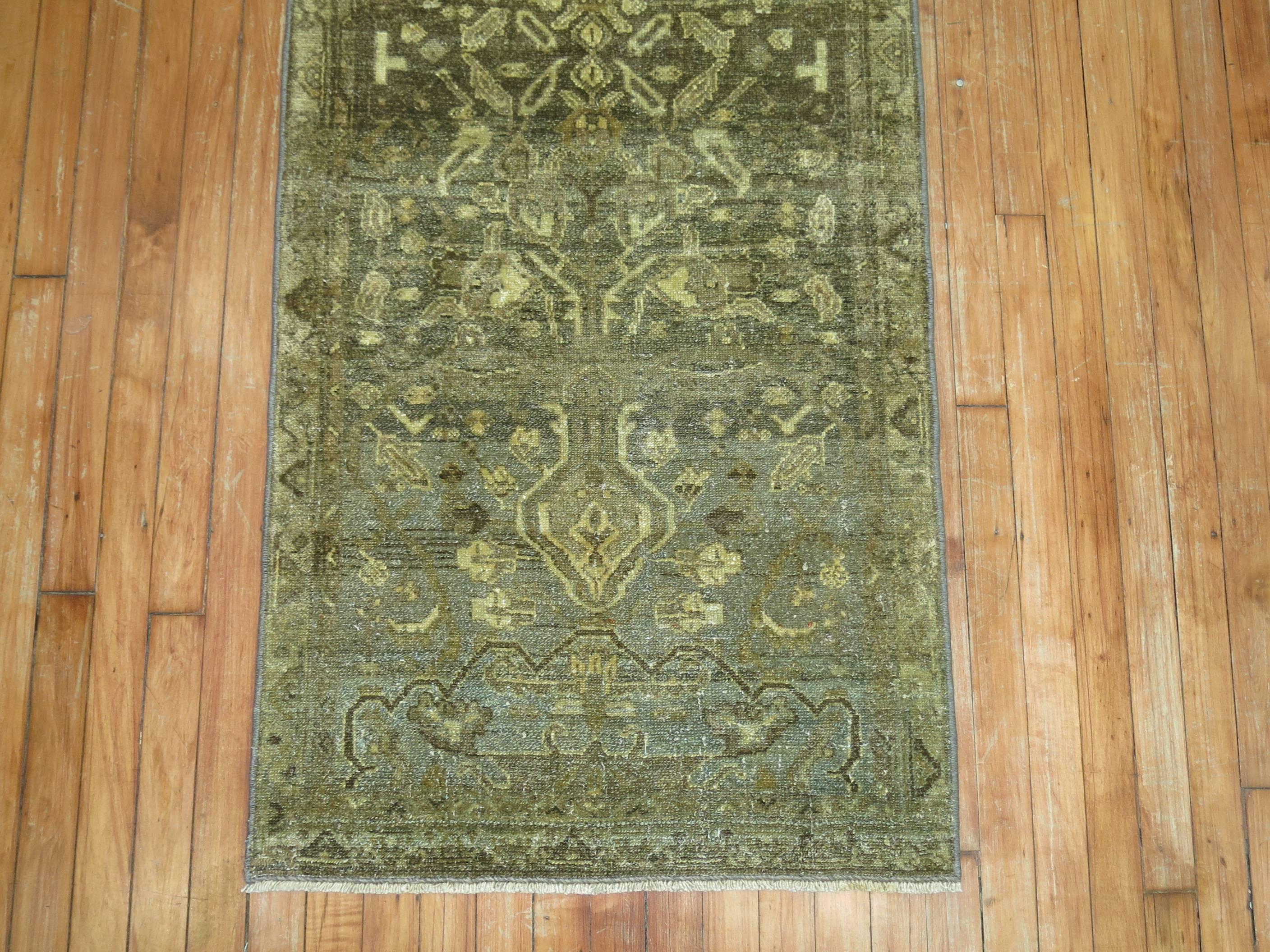 Early 20th century Persian Malayer rug in brown and green tones.

Measures: 2'5