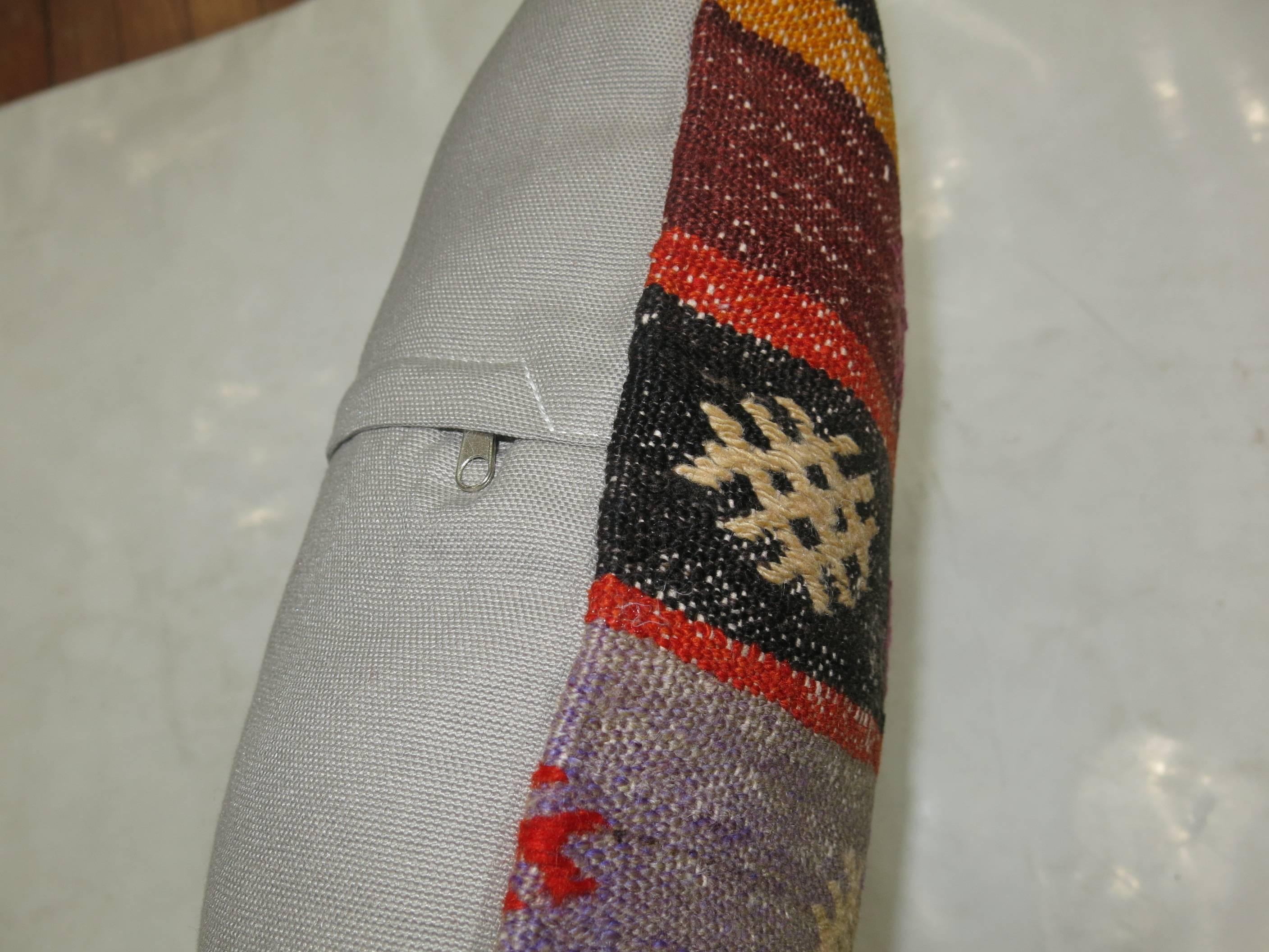 Pillow made from a vintage Turkish kilim with cotton back. Zipper closure and foam insert provided. 

Measures: 19'' x 19''.