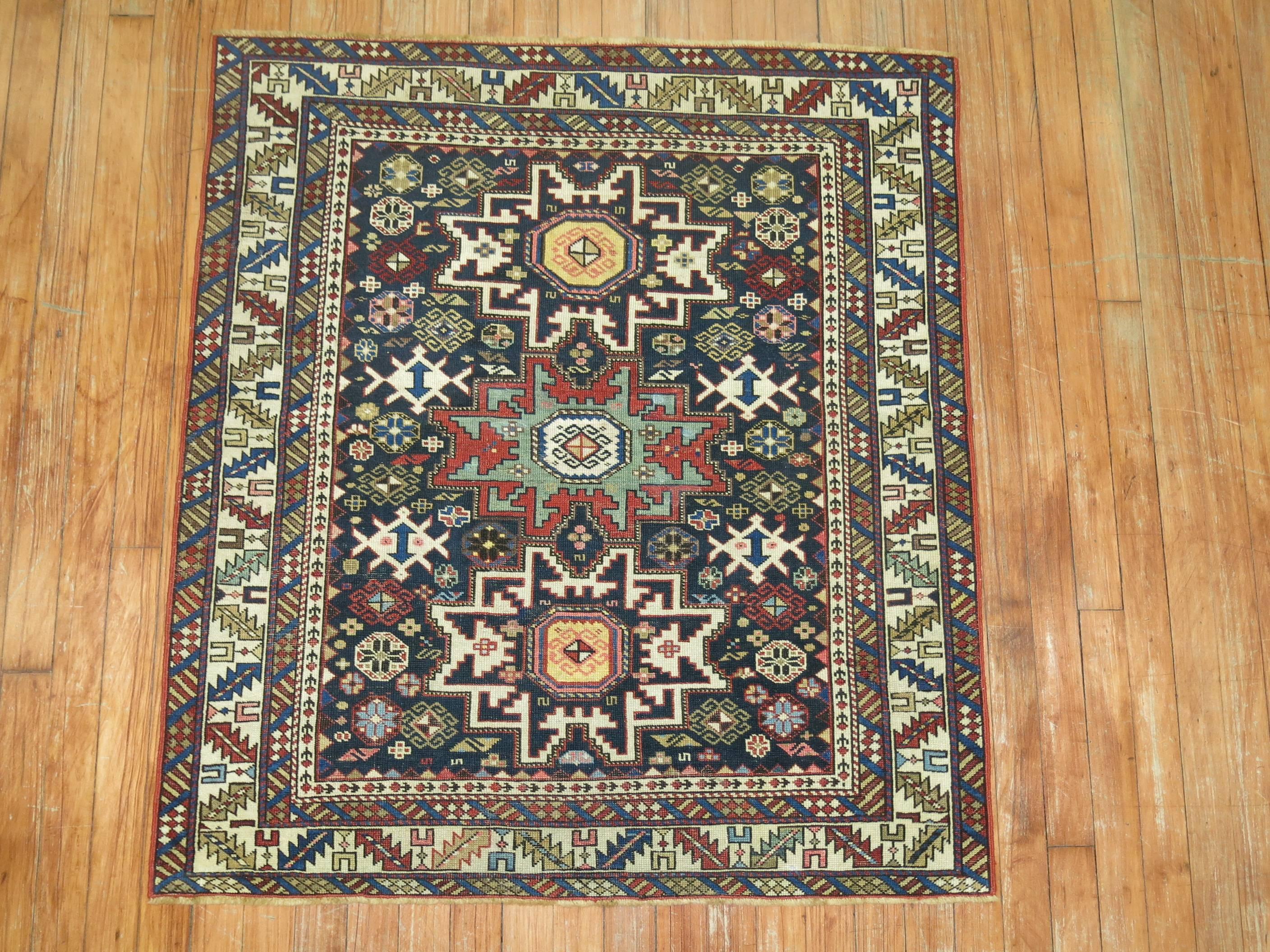 Rare size early 20th century antique Caucasian Shirvan rug.

The Caucasian nomad wove antique carpets for his own daily use, to satisfy his singular sense of creativity and harmony. Accordingly, he put a level of care into his work which seems