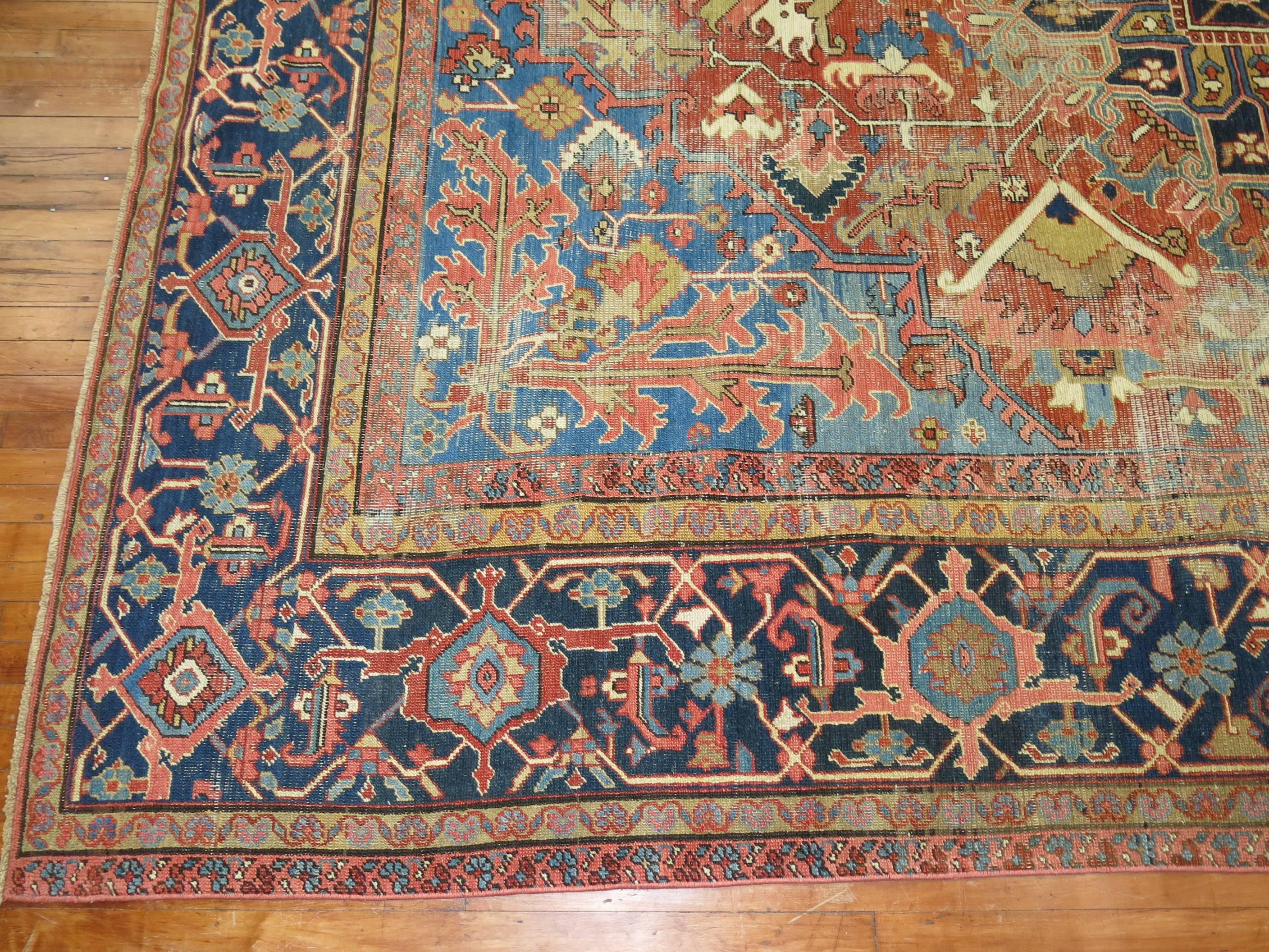 Colorful Room Size Antique Persian Heriz Rug.
We love the natural wear on this rug because it shows a real taste of the life that it's already lived, Also shows it has a had a history and character which truly makes it one of a kind gem.

Heriz