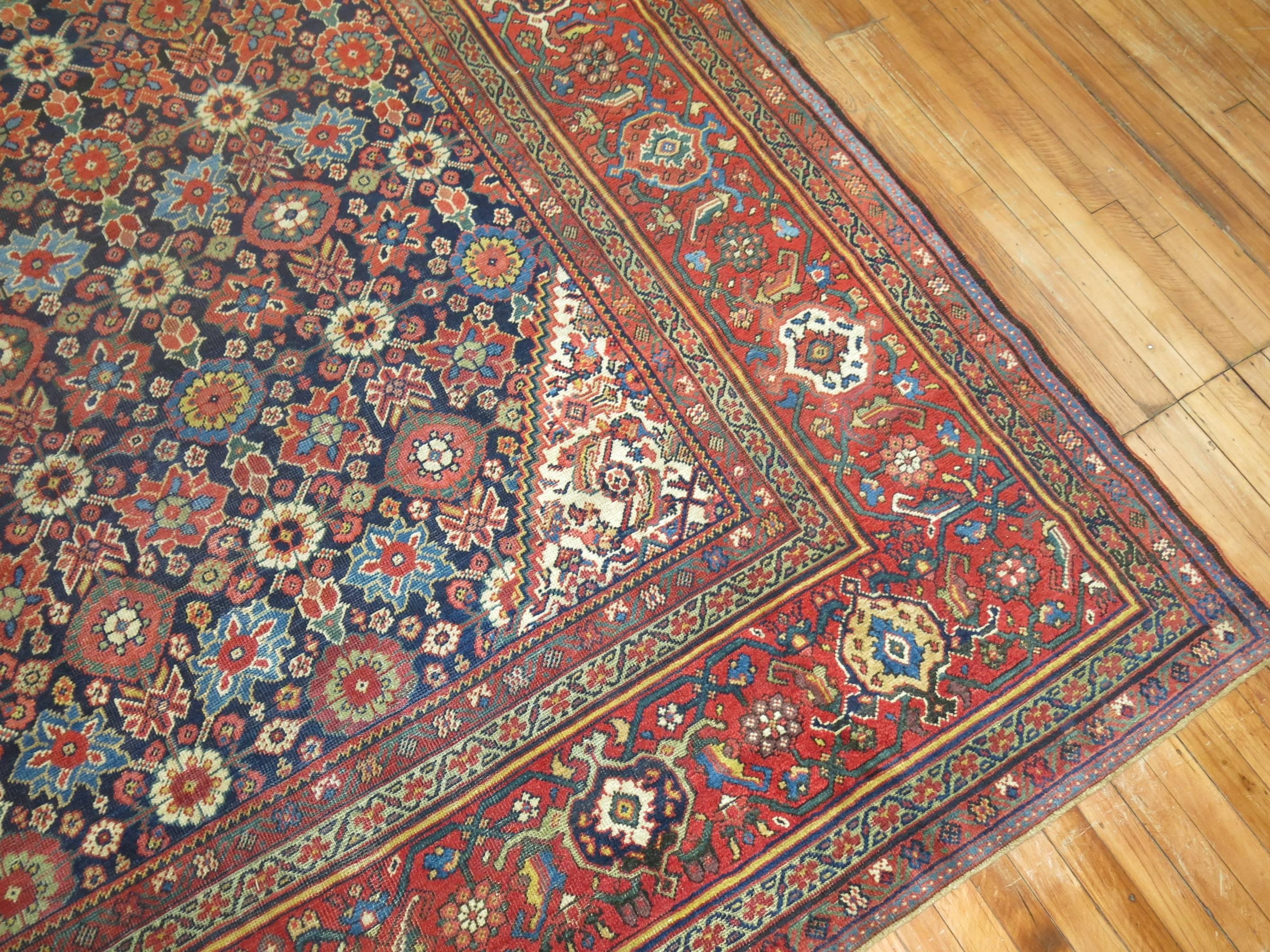 Stunning Navy Blue Field Persian Mahal Rug with an all over- design in an array of other lively colors. Colors and contrast on rug are more nicer in person too.

Often the finest in the antique Mahal style of antique rugs render spacious, very