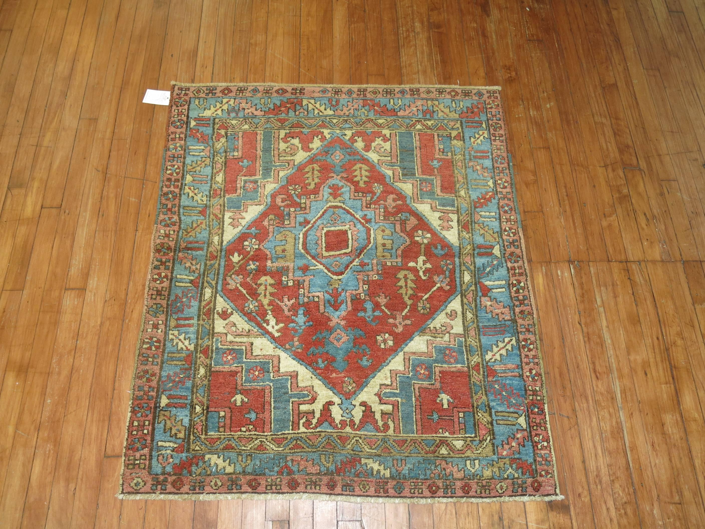 Rare Size Persian Square Heriz Rug.

Heriz carpets are beloved for their versatility and colors. Their geometry complements modern furnishings and their warm colors and artistic depth enhances antiques of all kinds. Their richness of color and