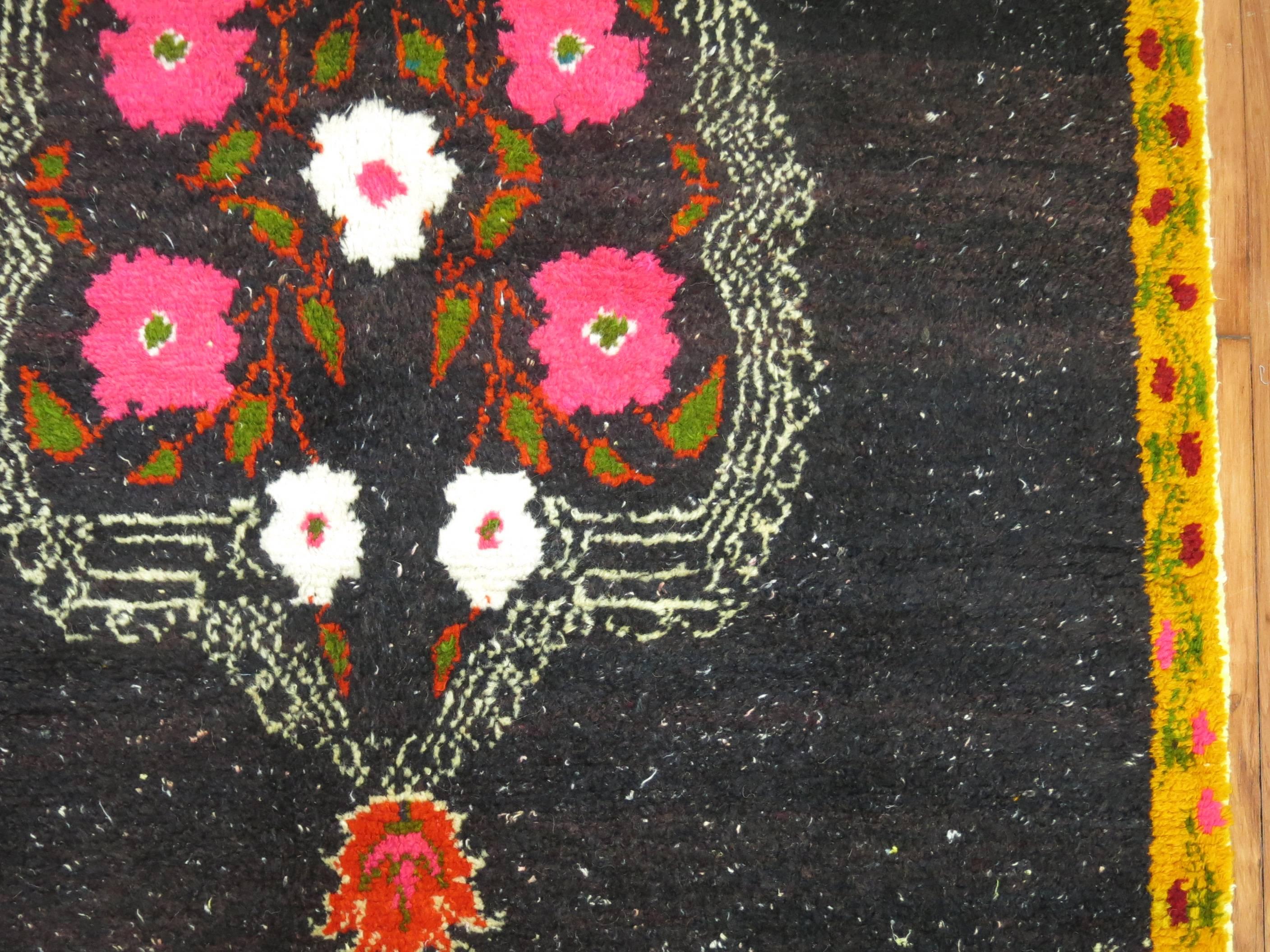 Vintage Karabagh rug with lovely flower motif.