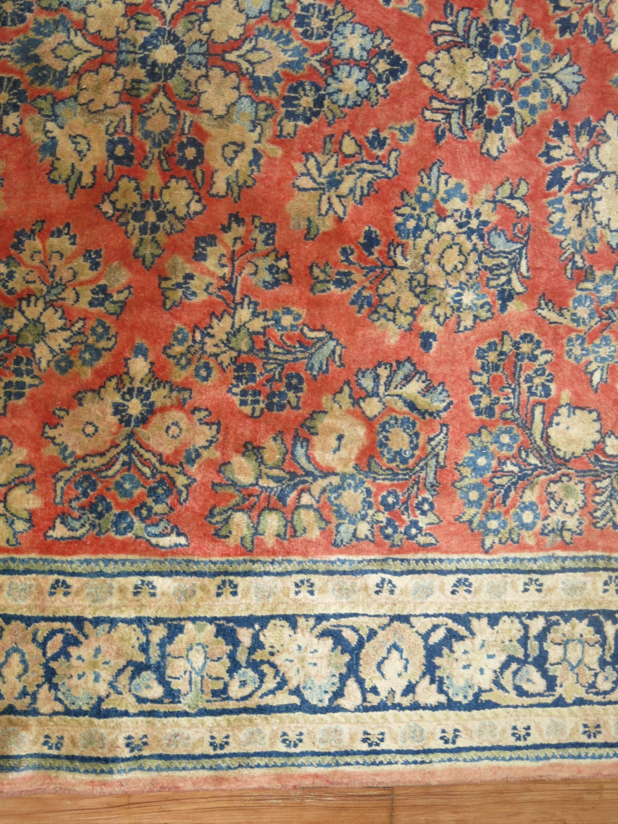 A rare size vintage Persian Sarouk carpet.

Measures: 5'4'' x 8'.