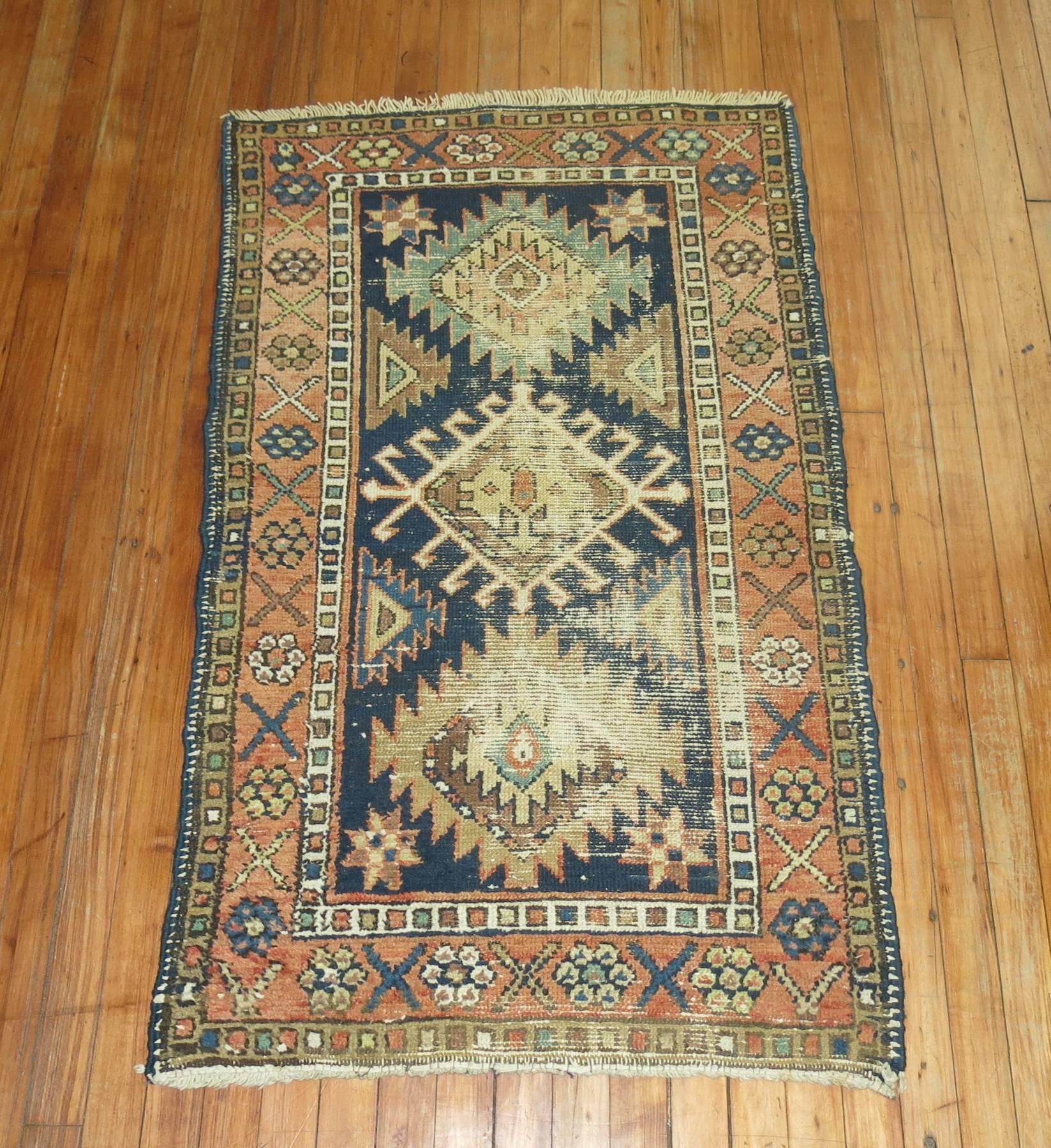 Early 20th century authentic Persian Heriz Rug.

We love the  natural wear on this rug because it shows a real taste of the life that it's already lived,  Also shows it has a had a history and character which  truly makes it one of a kind