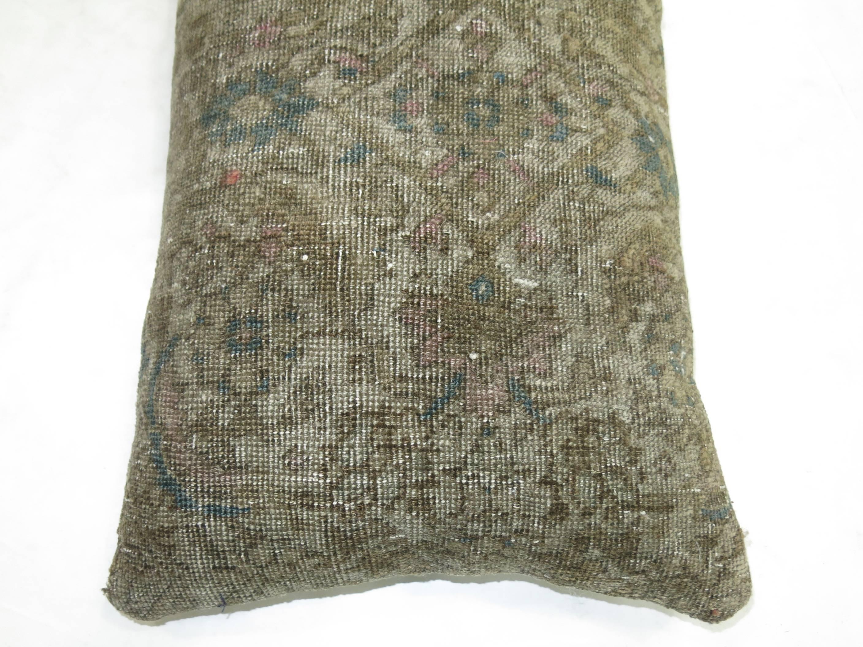 Pillow made from a vintage Persian rug.

15'' x 23''
