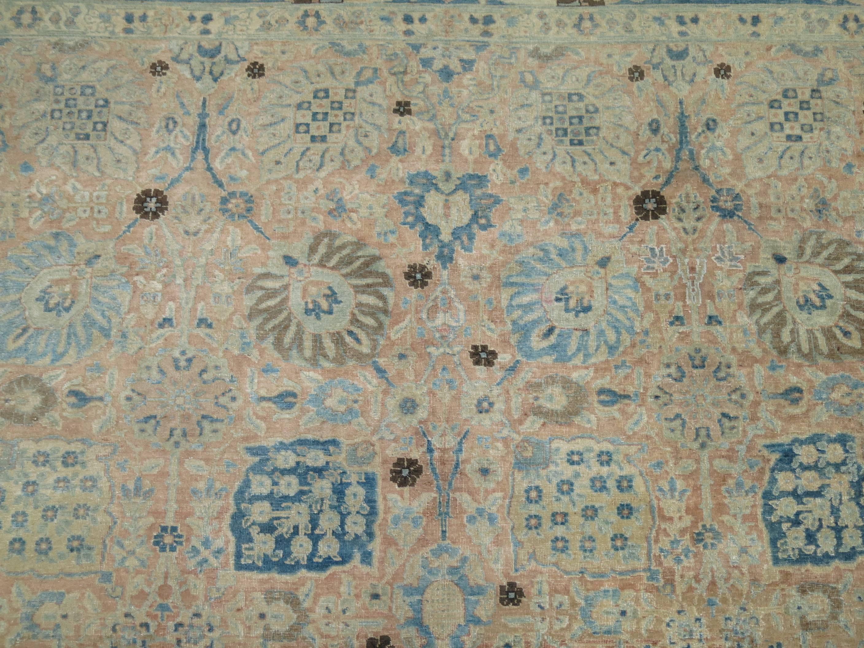 Exquisite early 20th century antique Persian Tabriz rug in camels and blues.
