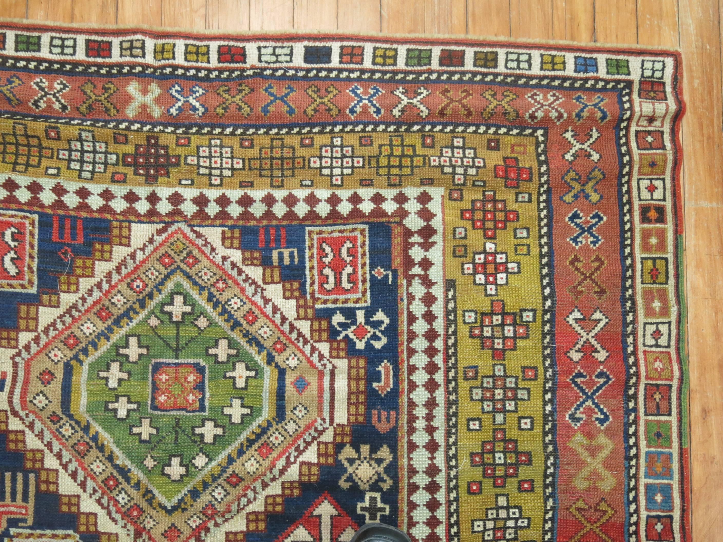 Colorful Handwoven Early 20th Century Antique Caucasian Accent Size Shirvan Rug In Good Condition For Sale In New York, NY