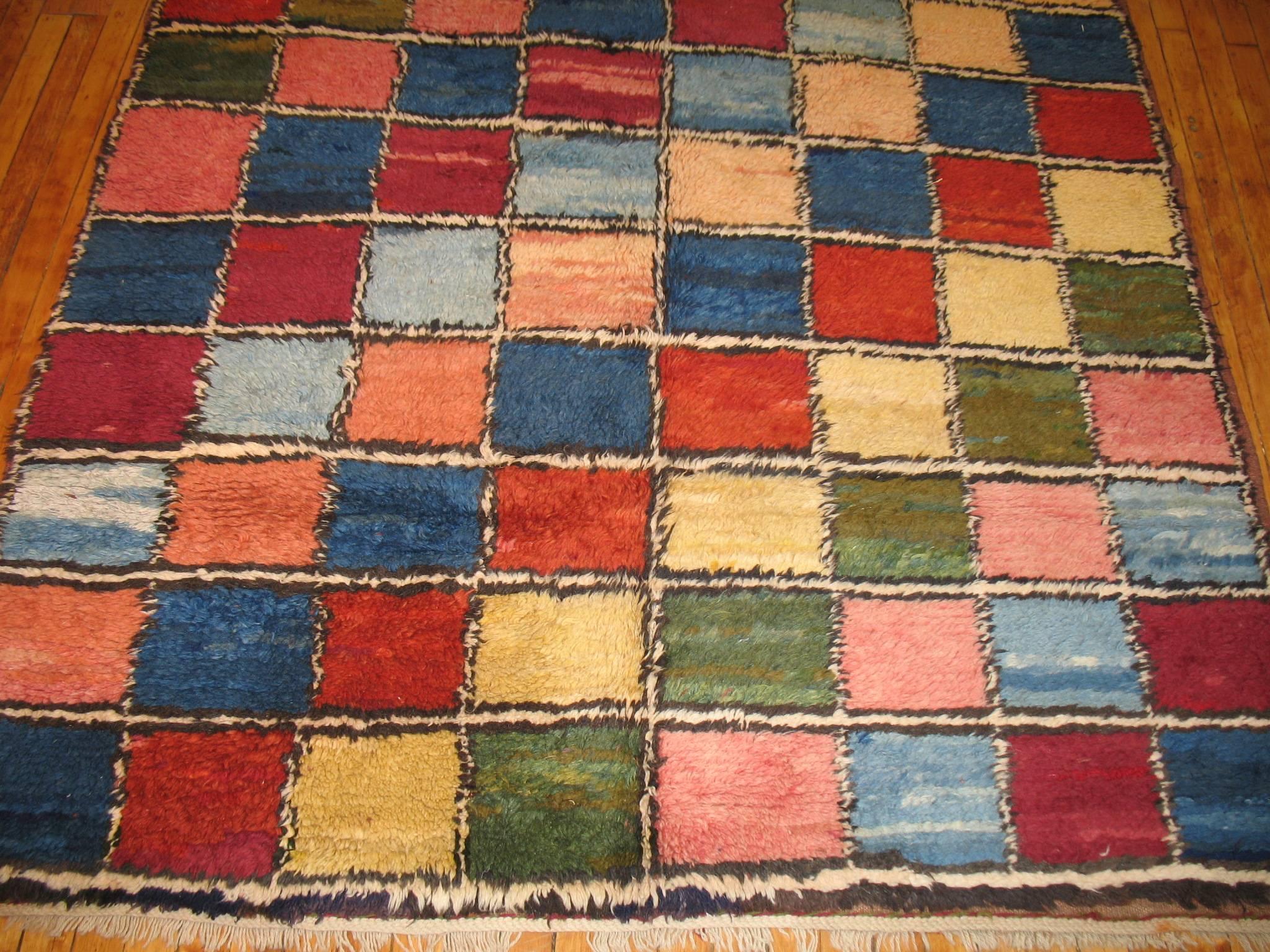 Midcentury Turkish rug with repeating square design.
