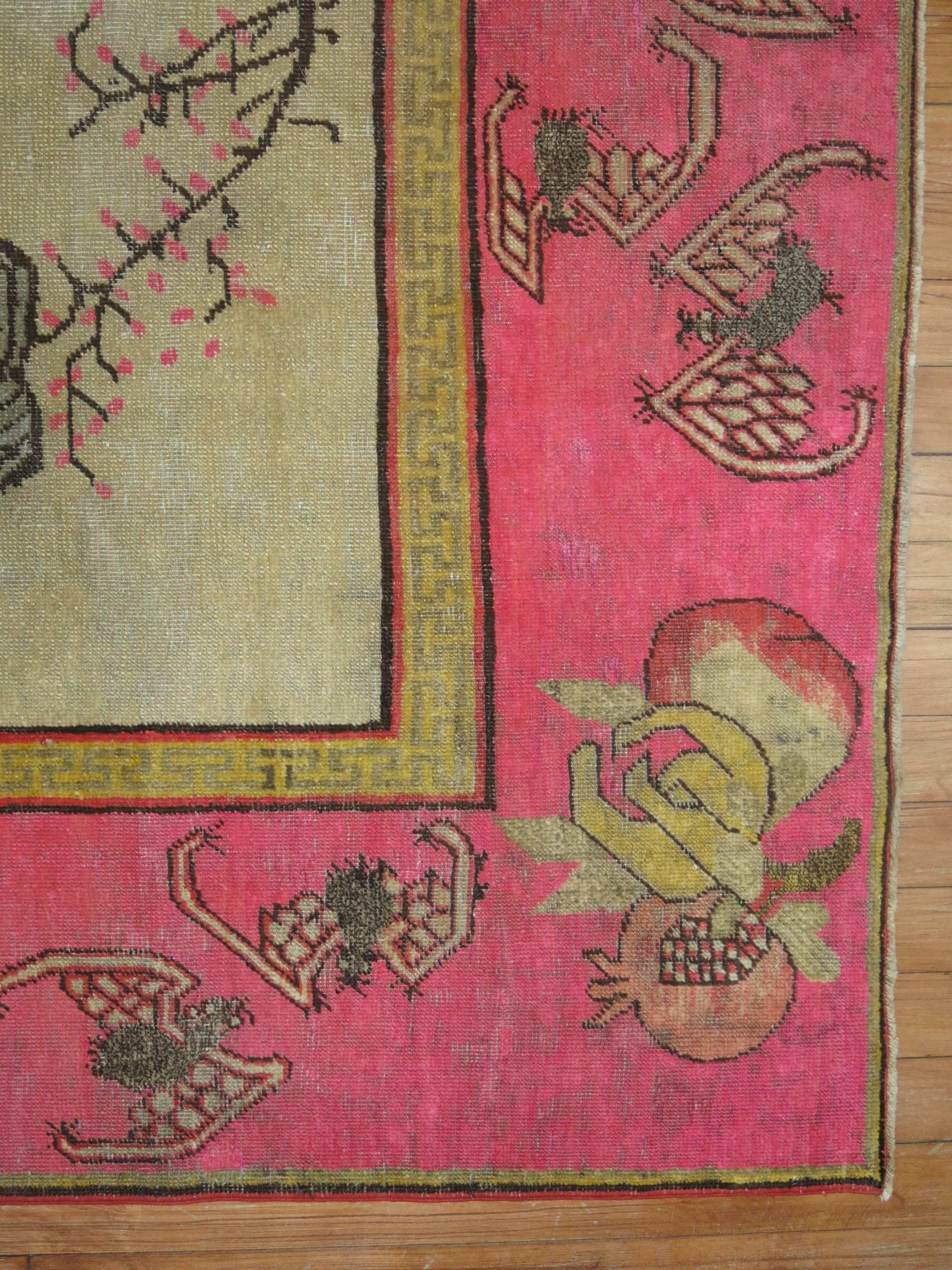 Antique Pictorial Khotan Rug with Bright Pink Border In Fair Condition In New York, NY