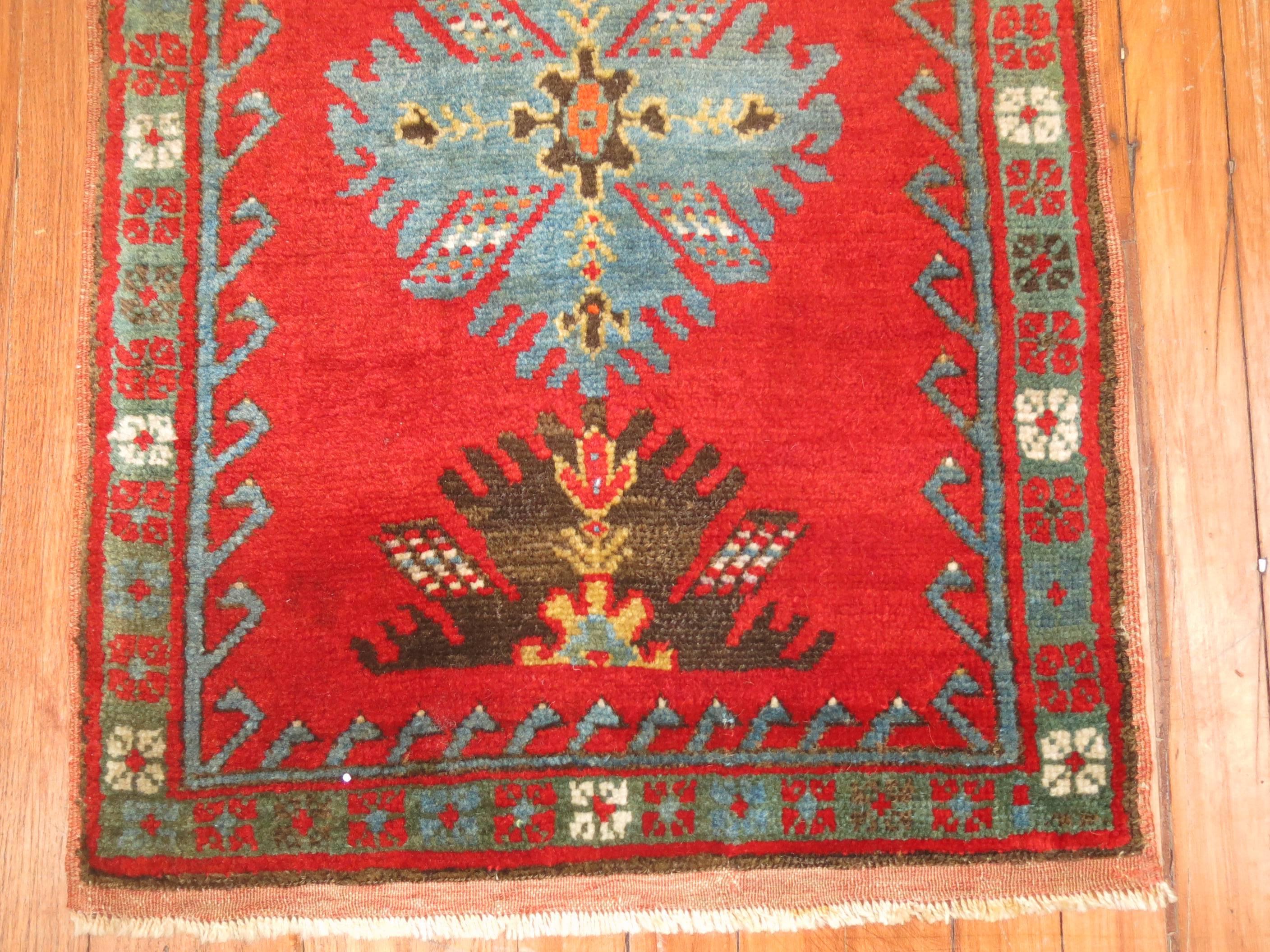 Rich colored Antique Turkish Yastik Rug.