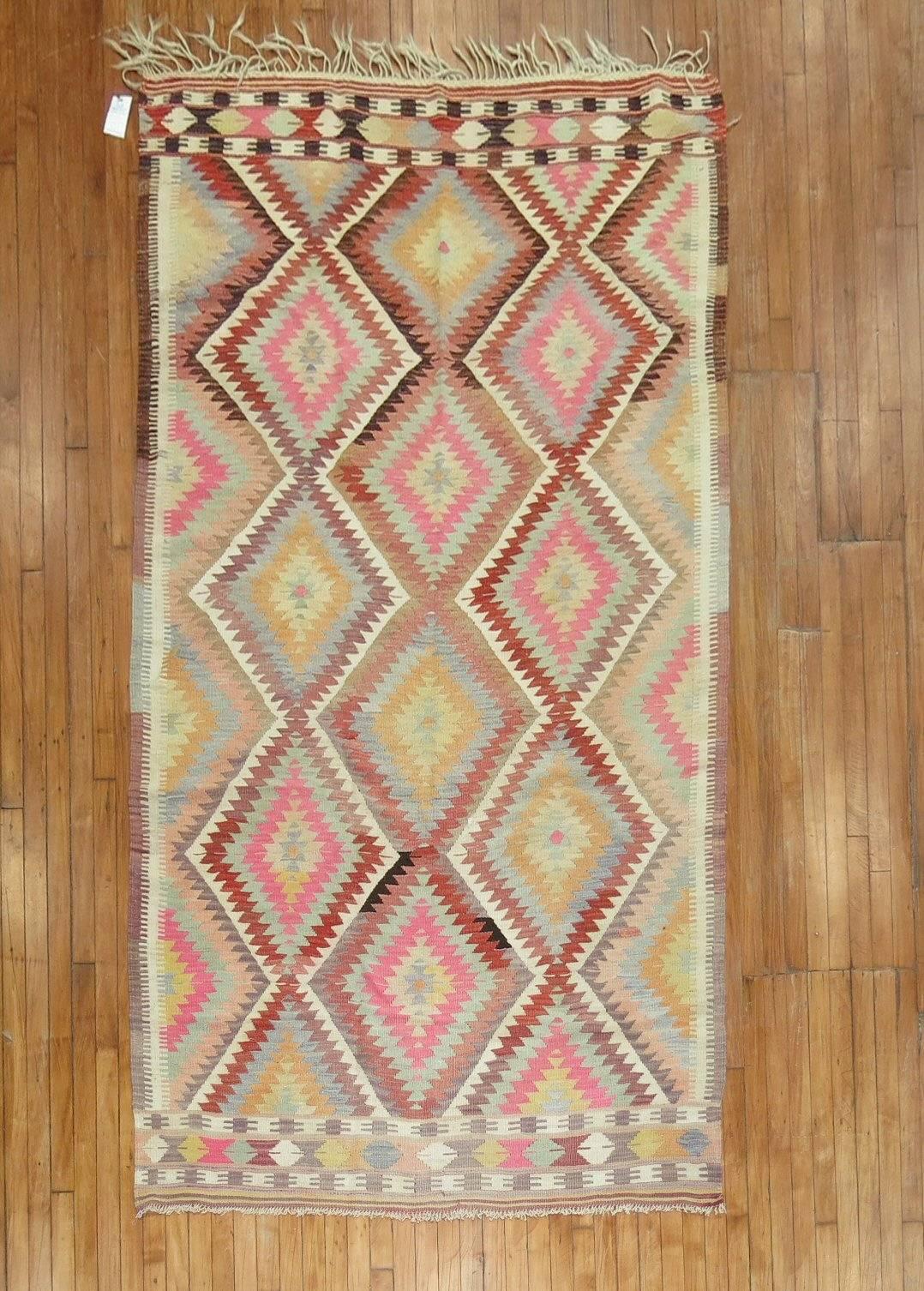 Mid-20th century Turkish Kilim with a fun loving large scalle all-over geometric design