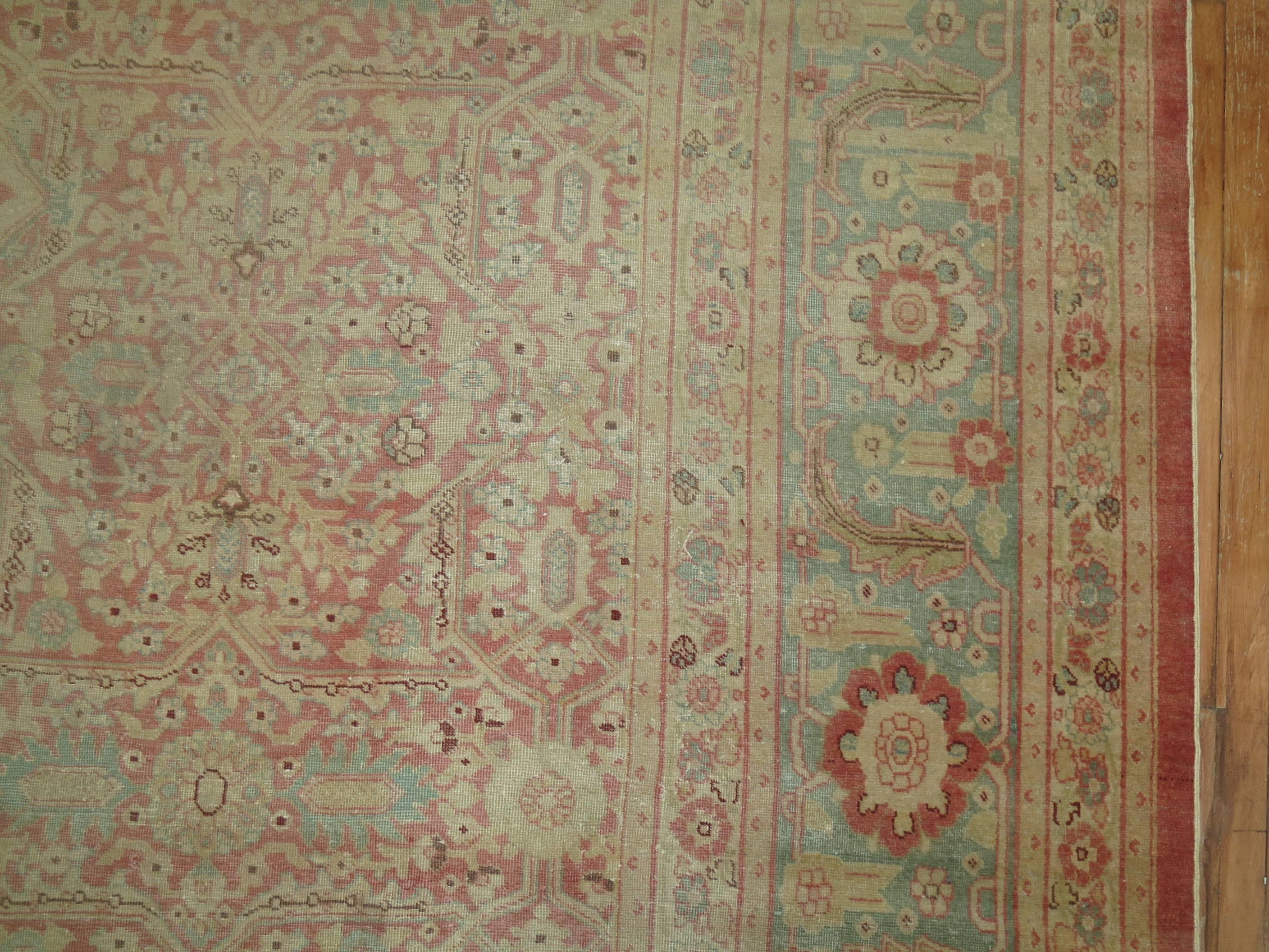 mint green and pink rug