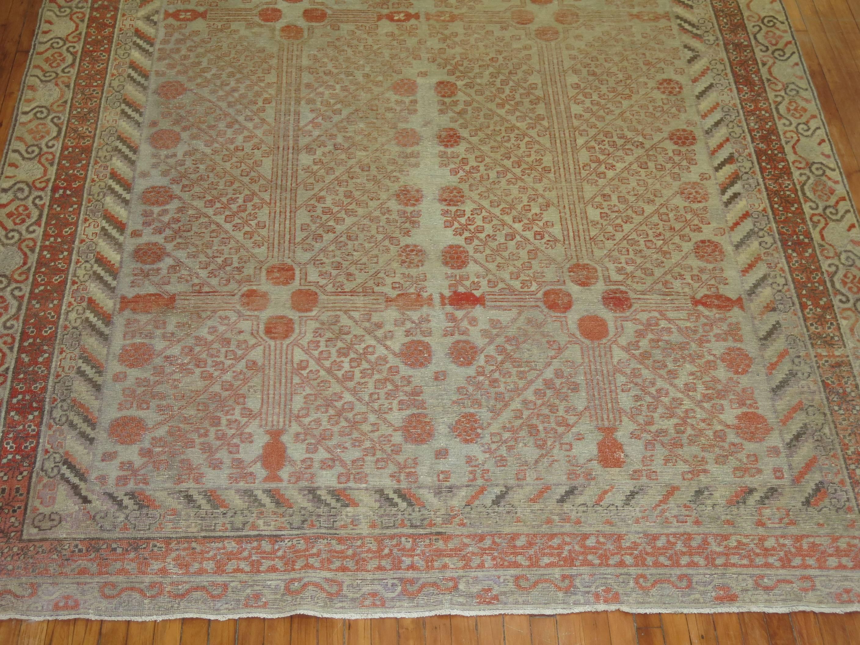 Hand-Knotted Large Shabby Chic Antique Khotan Rug, Late 19th Century