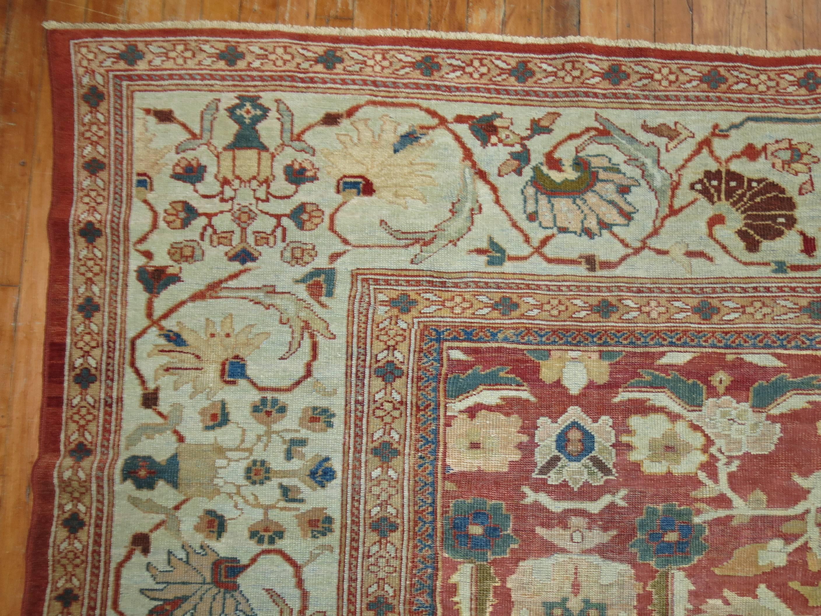 Un incroyable Sultanabad persan antique avec un fascinant design all-over, une bordure gris-bleu sur un champ rouge brûlé.

Mesures : 8'3