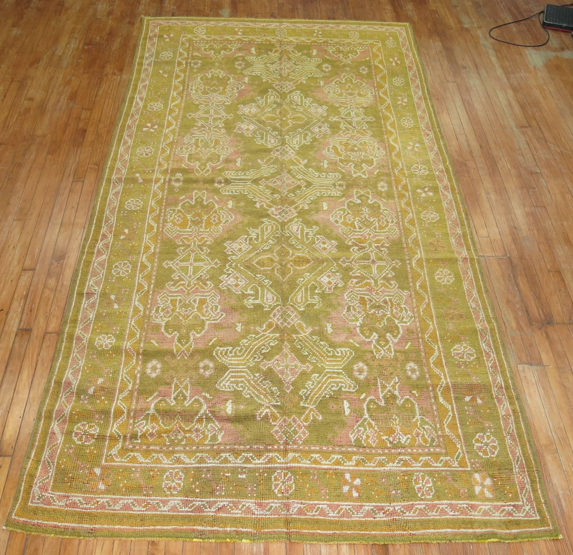 Beaux Arts Army Green Pink Mustard Color Gallery Size Turkish Oushak Early 20th Century Rug For Sale