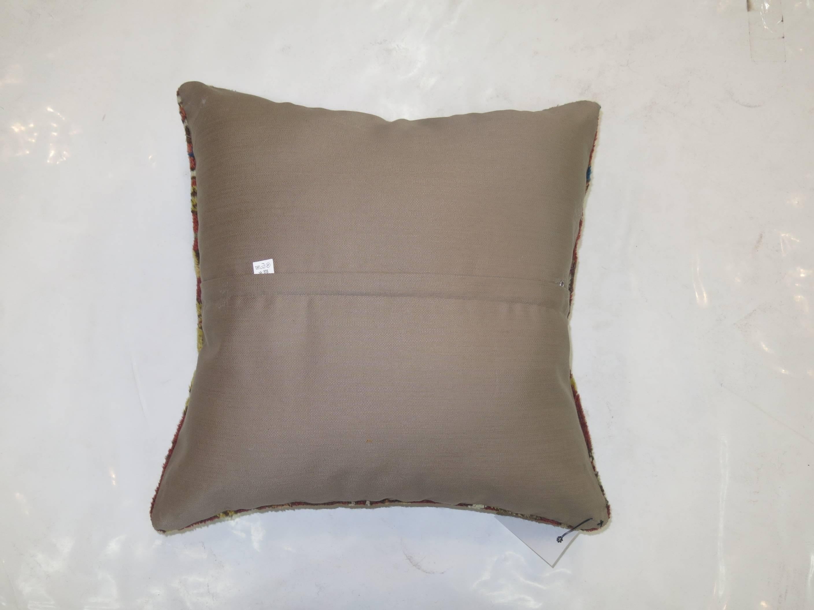 Pillow made from a worn Turkish Sivas pillow

Measures: 16'' x 16''.