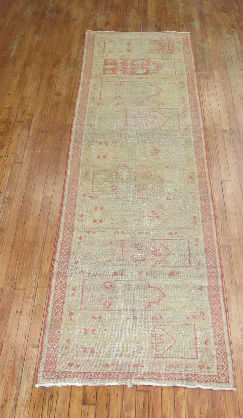 Rare size Khotan Samarkand runner featuring repetitive saff pattern often found in Turkish rugs.
