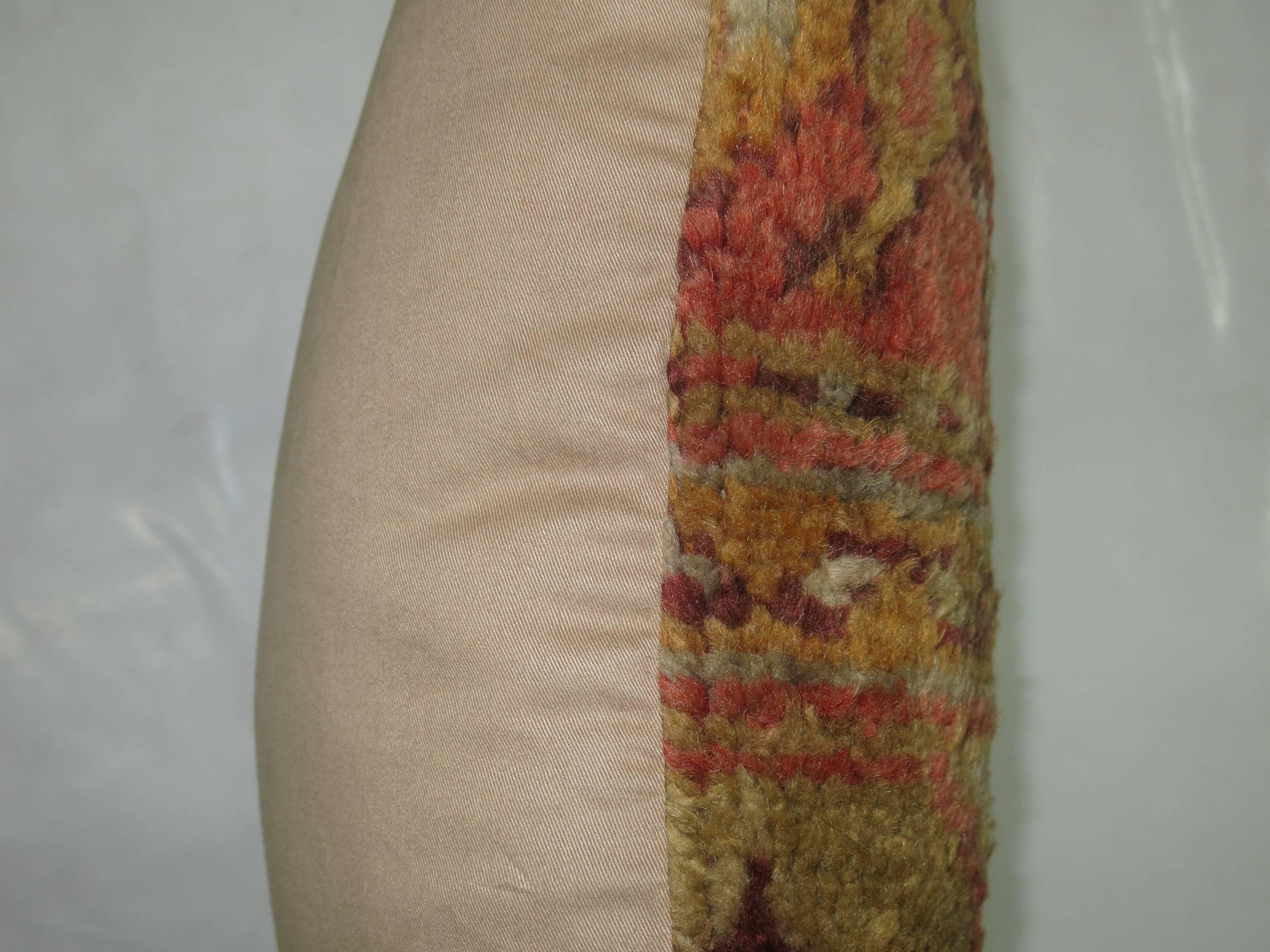 Pillow made from a Turkish Anatolian Oushak rug.