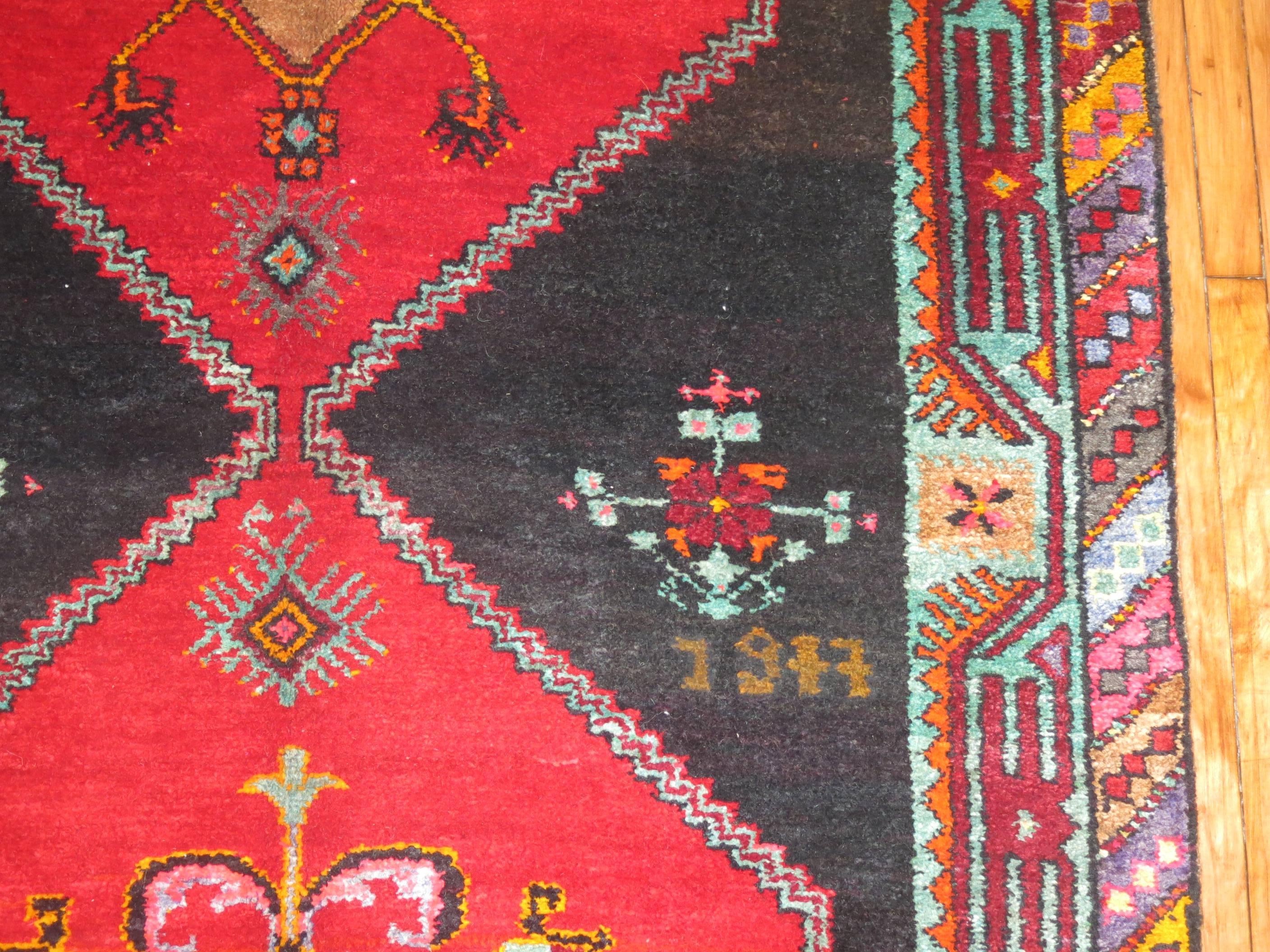 Bohemian style Turkish Kars long and wide gallery/corridor size rug.

5'1'' x 16'11''

Kars is a city located in Eastern Anatolia, has played an important role in Turkish history and was at the centre of the Turkish-Russian War between 1877-1878