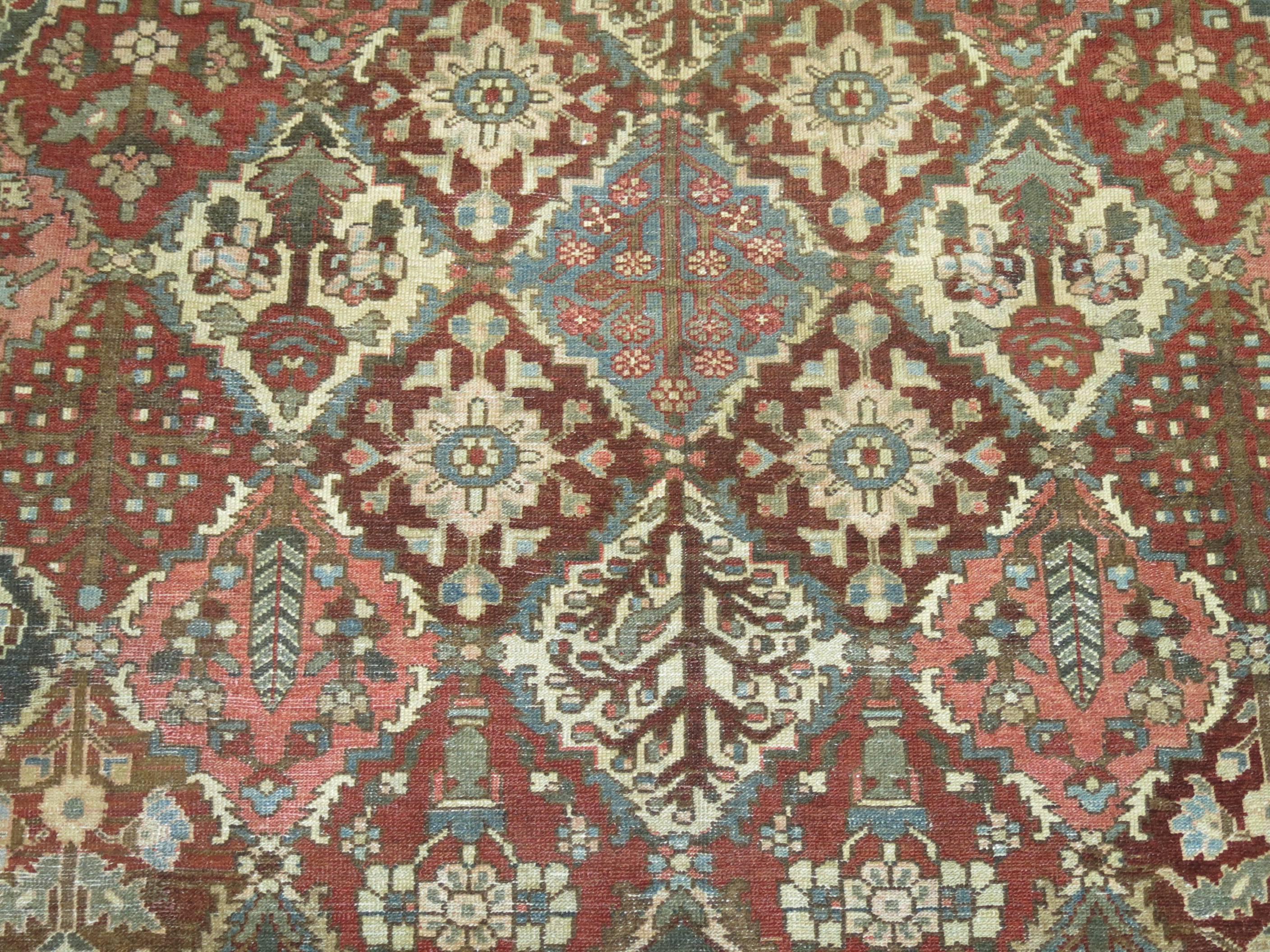 Square size all over design geometric Persian Bakhtiari rug in rustic tones,

circa 1920, measures: 10'3
