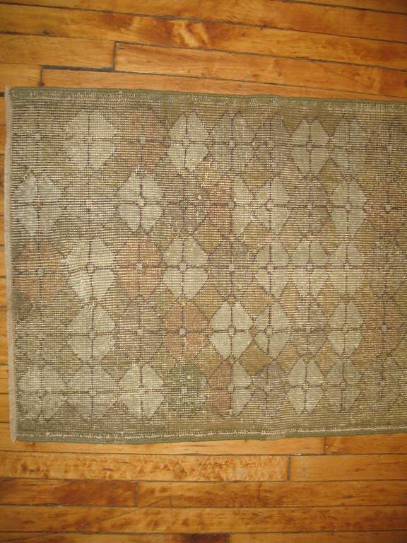 A weather textured mid-20th Turkish Anatolian runner.