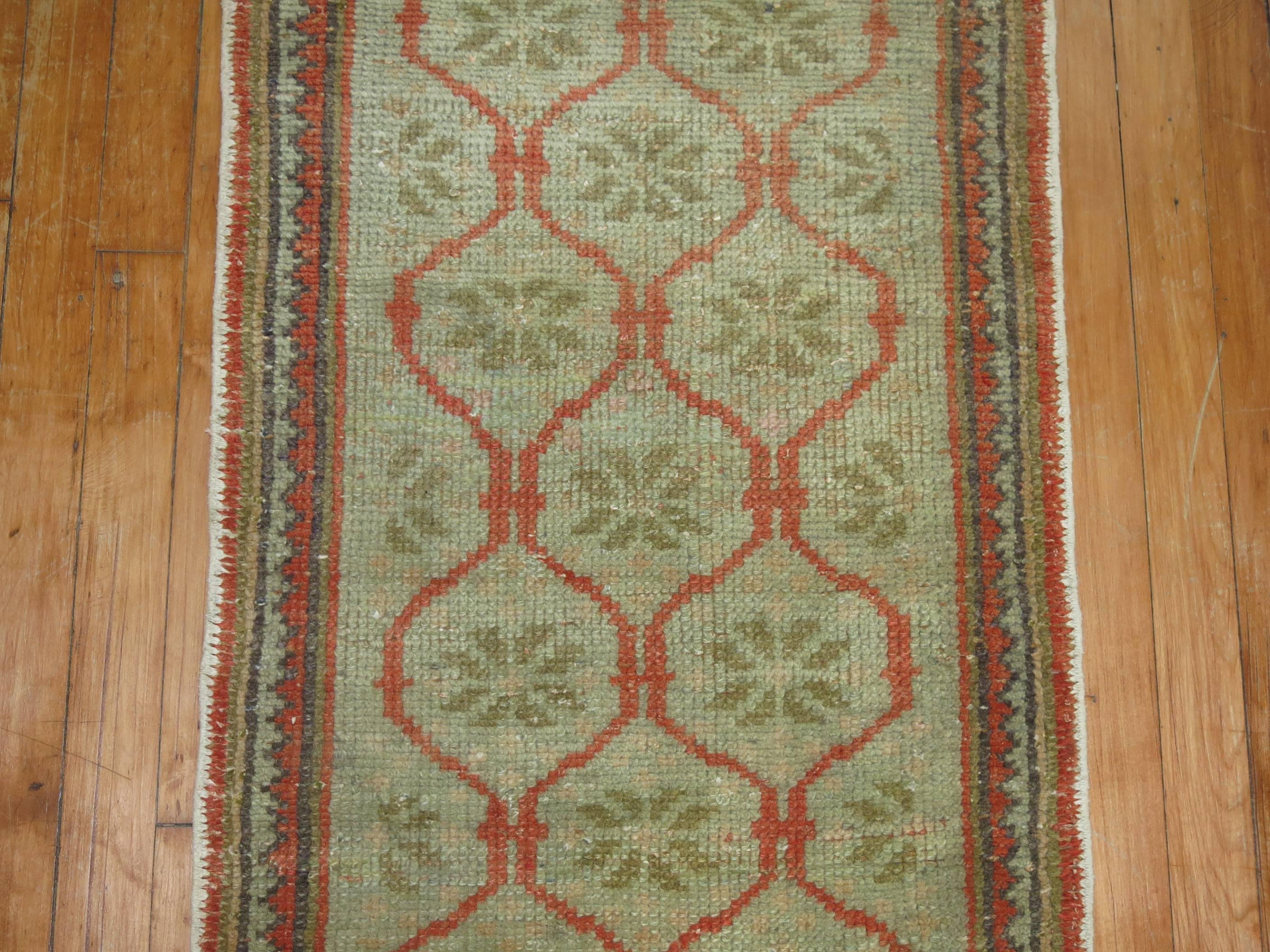 Hand-Knotted Green Wool 20th Century Turkish Oushak Narrow Runner For Sale
