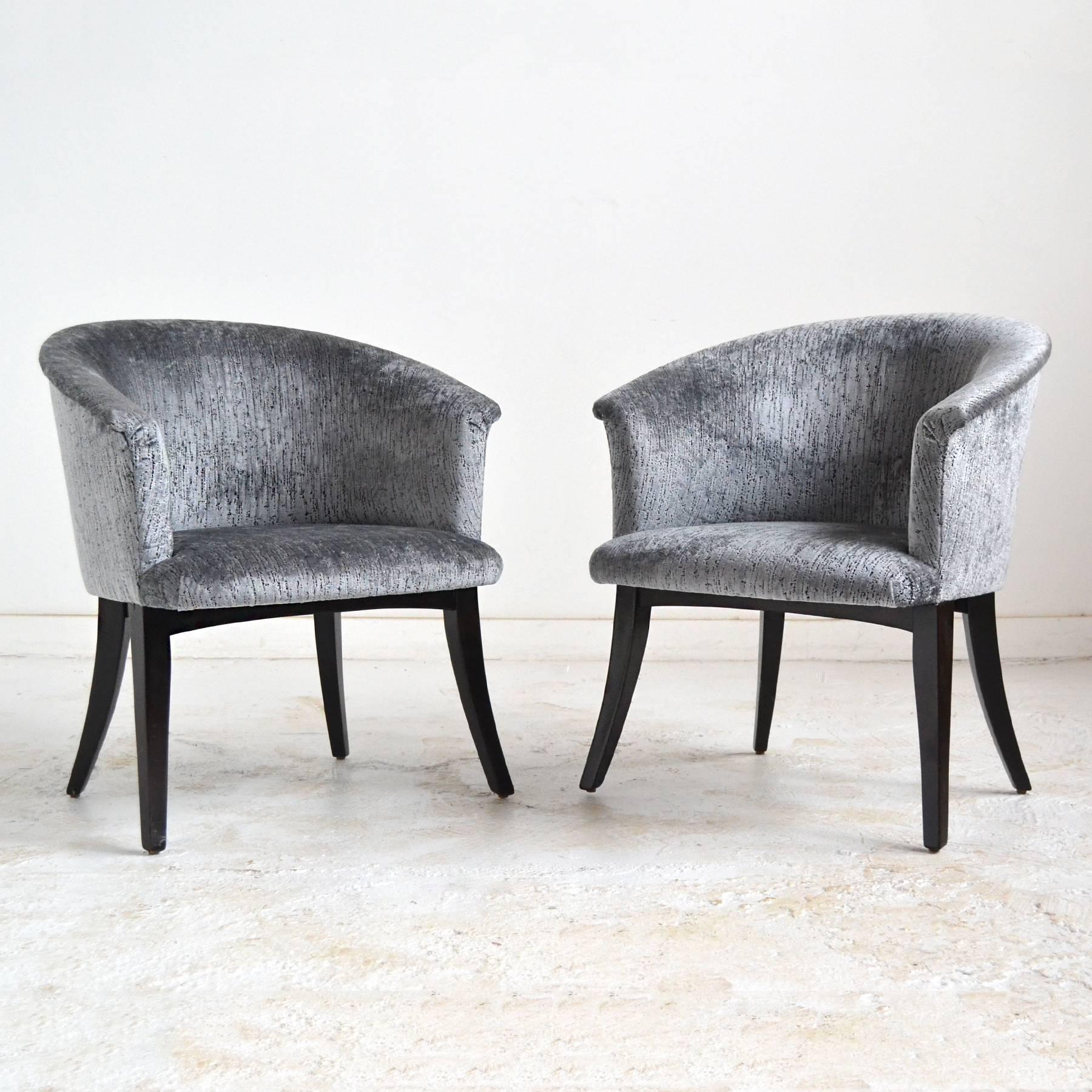 These elegant club chairs are from the period when the reigns were handed from long-time design director Edward Wormley to Roger Sprunger, so we are uncertain which noteworthy designer is the creator of these beautiful chairs.
The upholstered seats