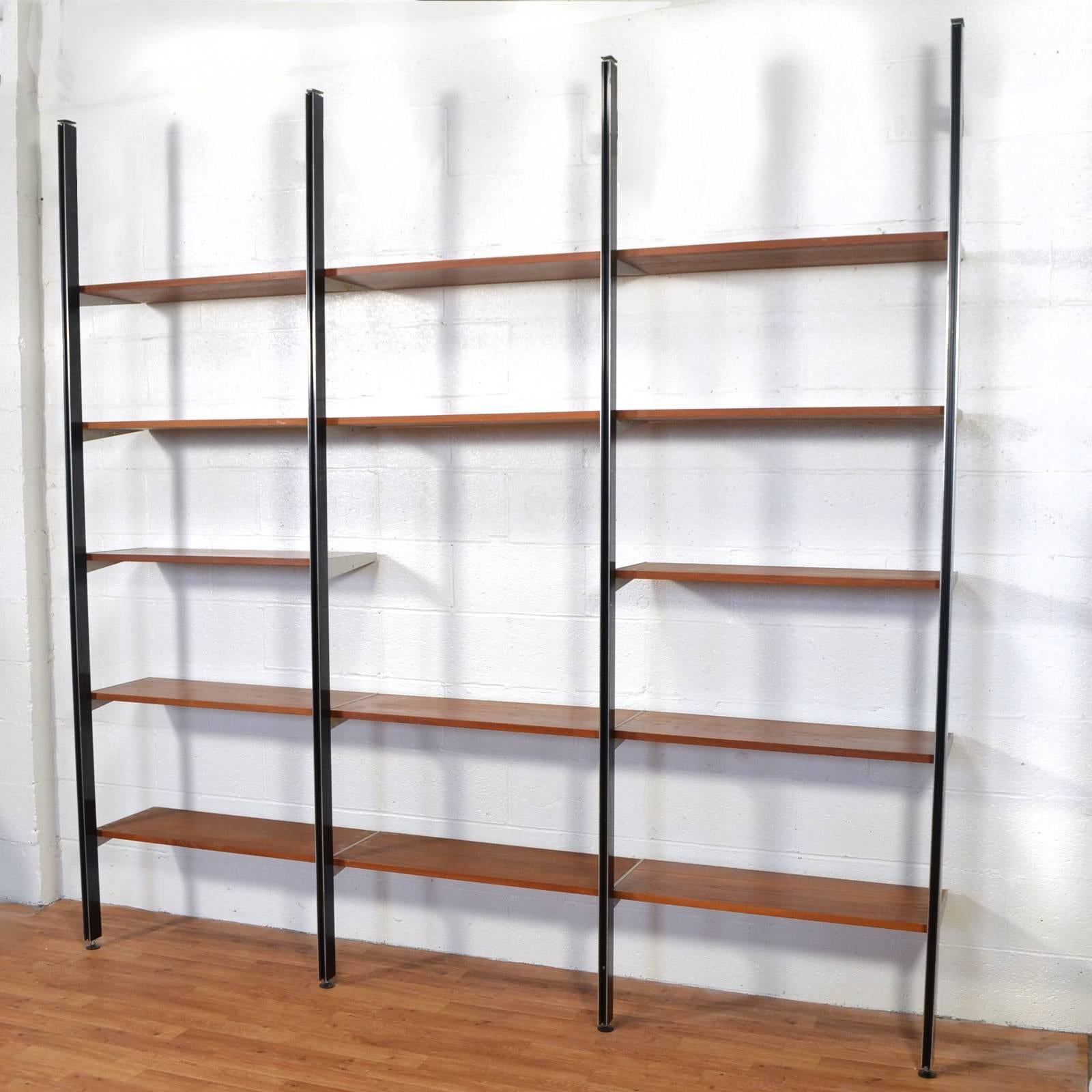 This CSS shelving unt is an excellent example. The beautiful minimalist design is comprised of four tension-mounted uprights and fourteen teak shelves. Perfect for books, media, or accessories,  the shelves can be arranged and adjusted to best suit