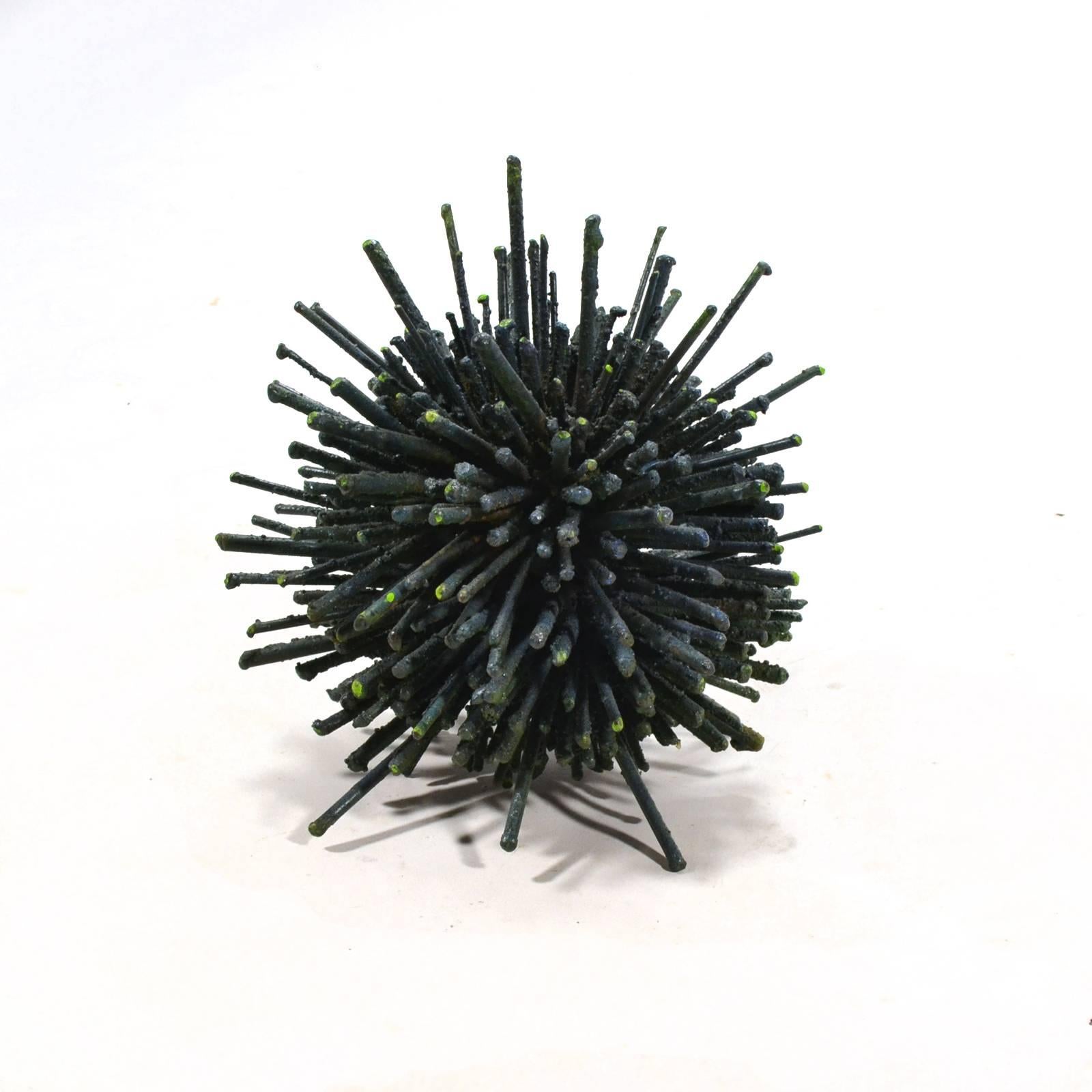 A wonderful and whimsical piece by sculptor James Bearden, this piece is composed of rods arranged in a dense burst reminiscent of the dandelion sculptures by Harry Bertoia. The sculpture has a wonderful composition, great texture, and subtle color,