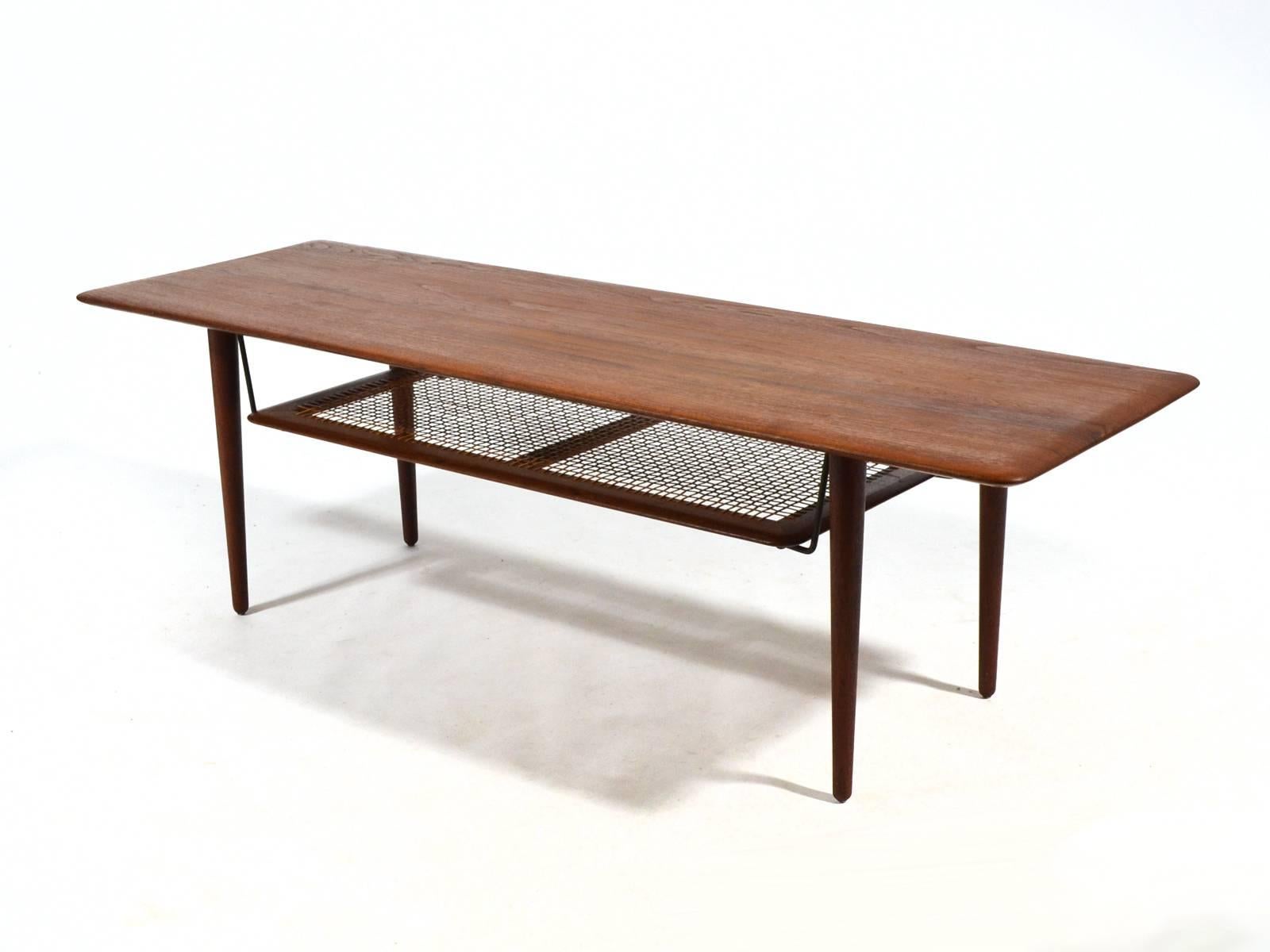Mid-20th Century Peter Hvidt & Orla Mølgaard Nielsen Coffee Table with Cane Shelf