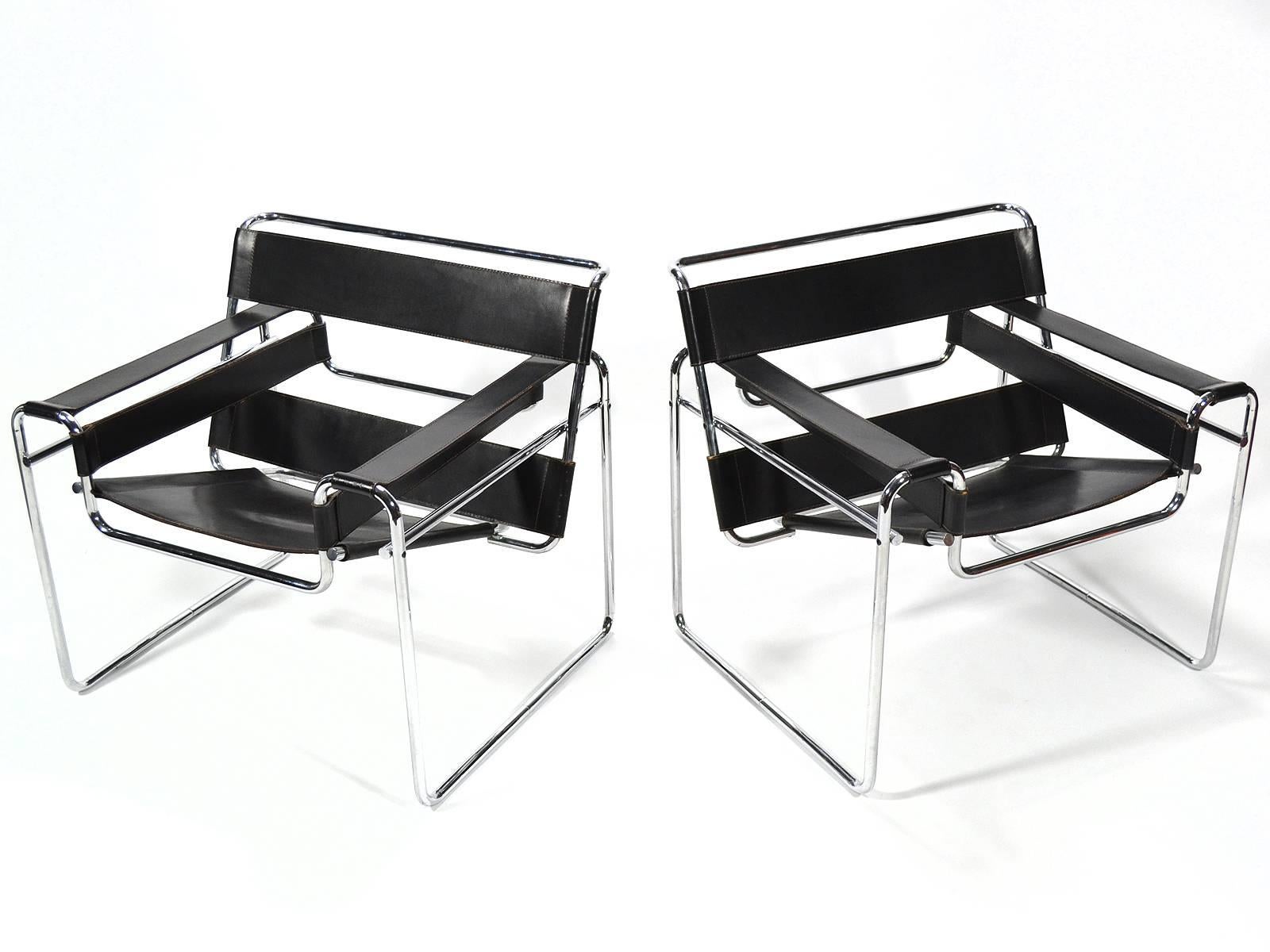 Marcel Breuer's 1925 design is a widely recognized masterpiece of modern furniture, having long ago achieved iconic status. This pair of Wassily chairs date to 1968, the year Knoll Associates became Knoll International, acquired Italian furniture