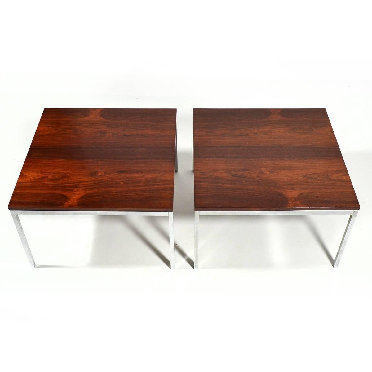 Florence Knoll's designs are famous for their understated quality, refined details and timeless appeal. These two Model 2514 MC side/ end tables are perfect examples with bases of stainless steel supporting stunning perfectly matched rosewood tops.