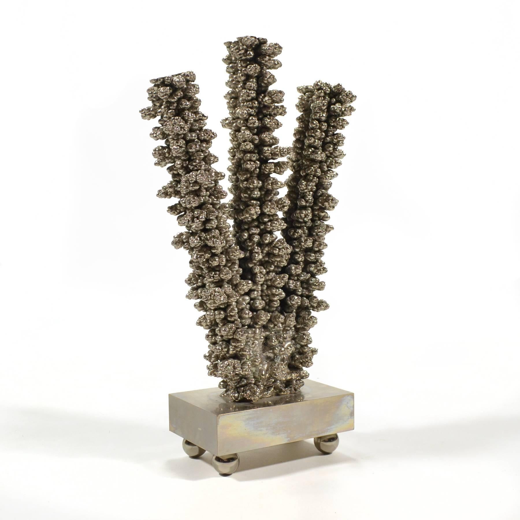 This remarkable abstraction by Fiskel is a very evocative form that makes one think of shapes in nature such as coral. It is difficult to tell if it was created as a lost-wax casting, or an additive process, but it has an incredibly rich, visceral