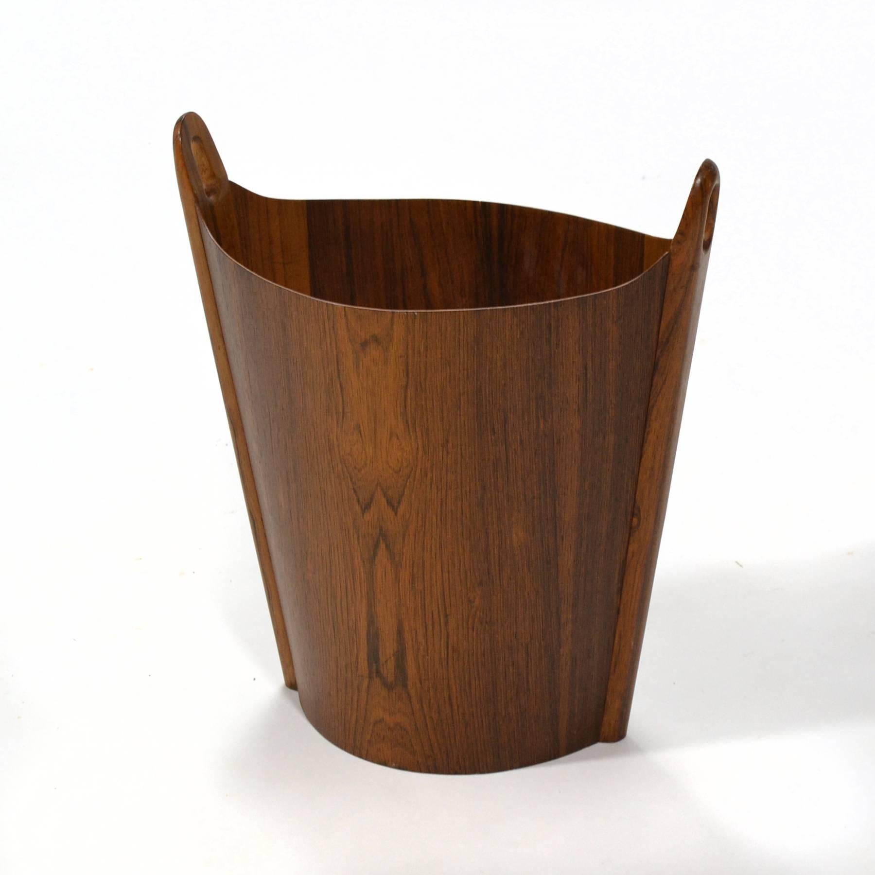 We have seen this wooden wastebasket design by Einar Barnes for P.S. Heggen described as the 