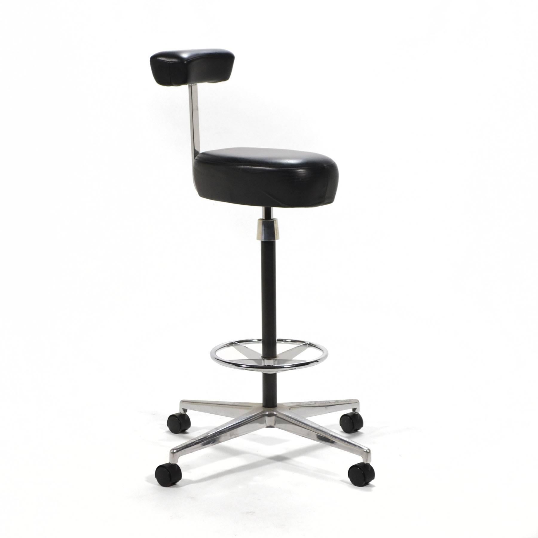 Designed in 1964 as part of the flexible, open, action office program, the Perch by George Nelson & assoc. is a versatile piece. With an adjustable height, it offers a high seat with a small arm/ backrest and a ring footrest. This allows it to be