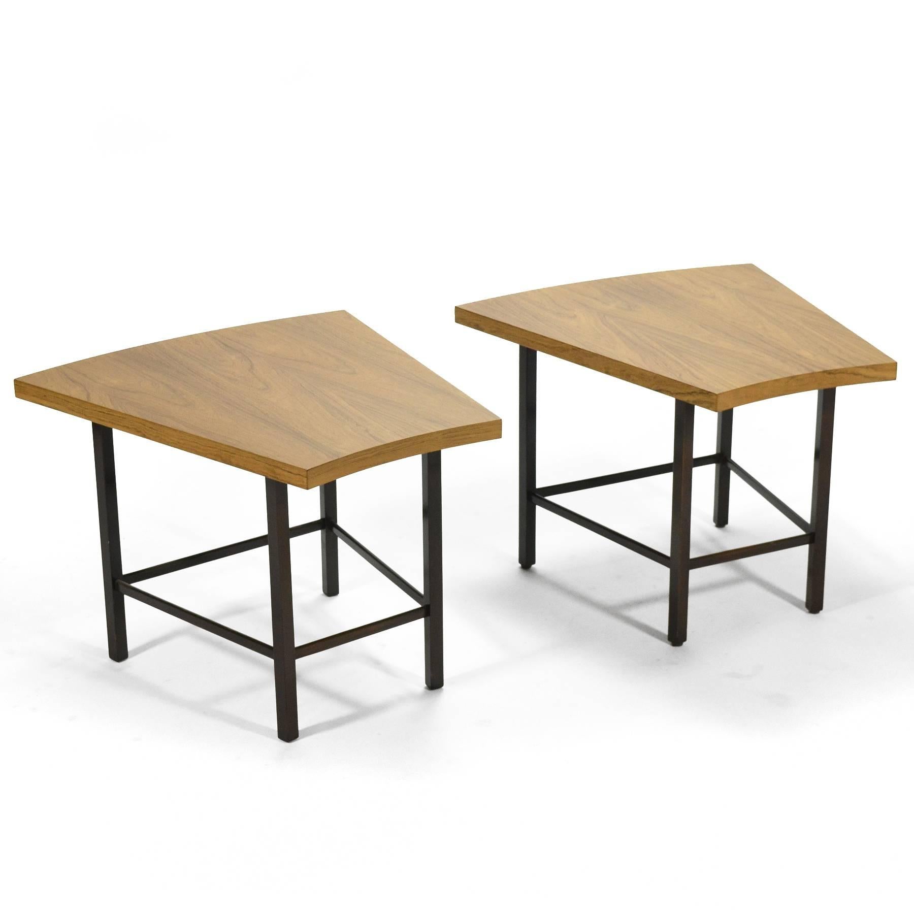This lovely pair of trapezoidal tables by Harvey Probber have tops of bleached rosewood supported by mahogany bases. The combination of curved and straight lines are especially pleasing. They function perfectly as side tables, end tables or