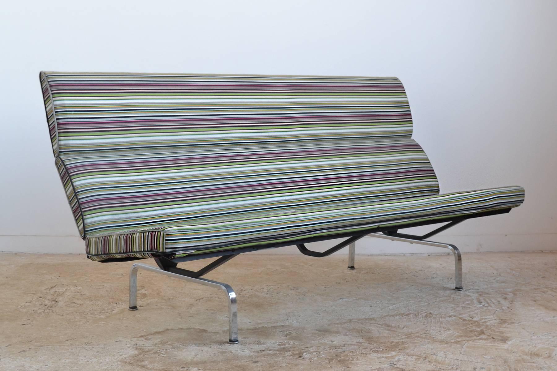The Classic, clean-lined sofa design by Charles and Ray Eames upholstered in a wonderful Paul Smith striped fabric by Maharam.