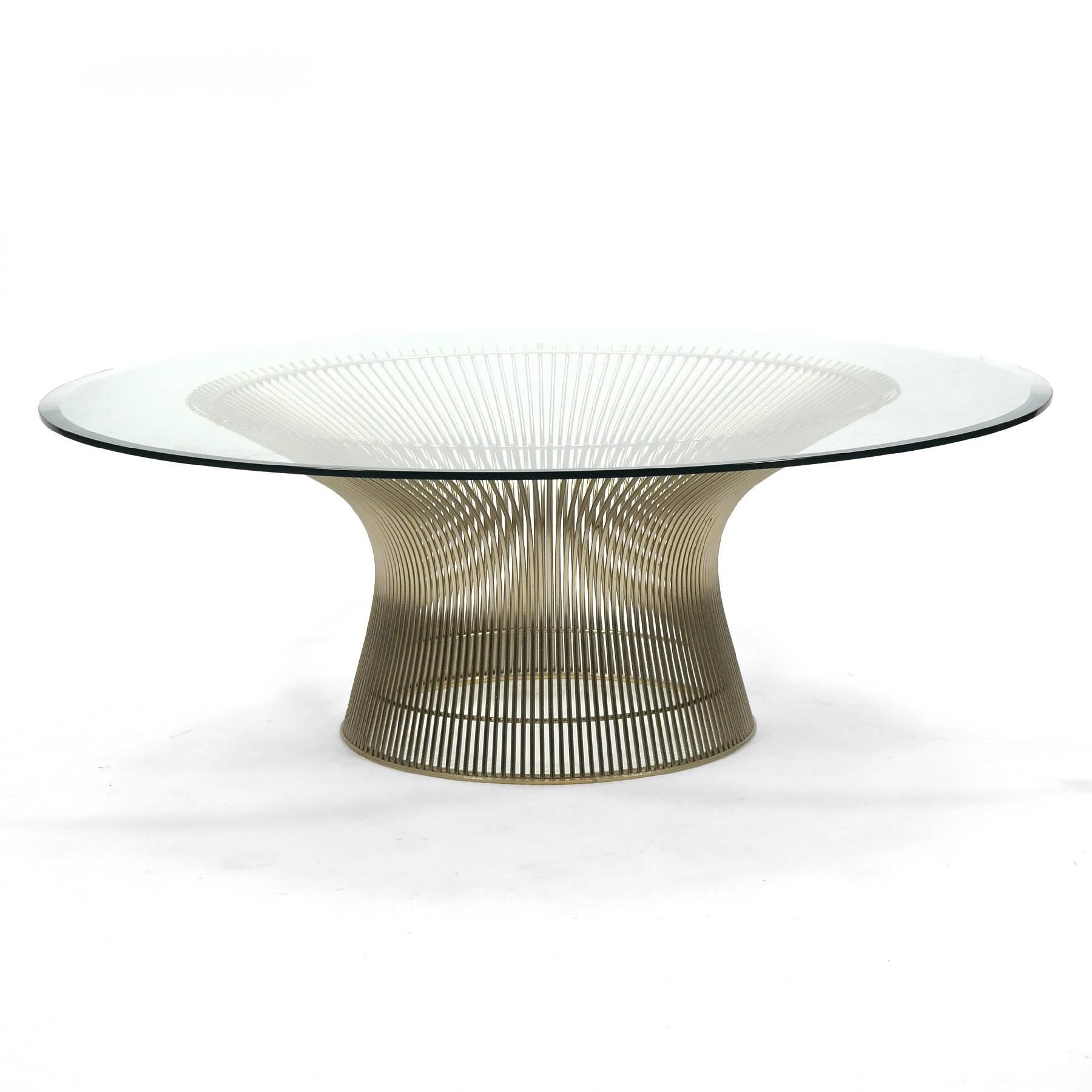 Warren Platner's landmark 1966 collection for Knoll exhibits a grace and beauty that belie the technical virtuosity of the designs. A wire sculpture that captures space and delights the eye, this coffee table has a chrome base and is topped with a