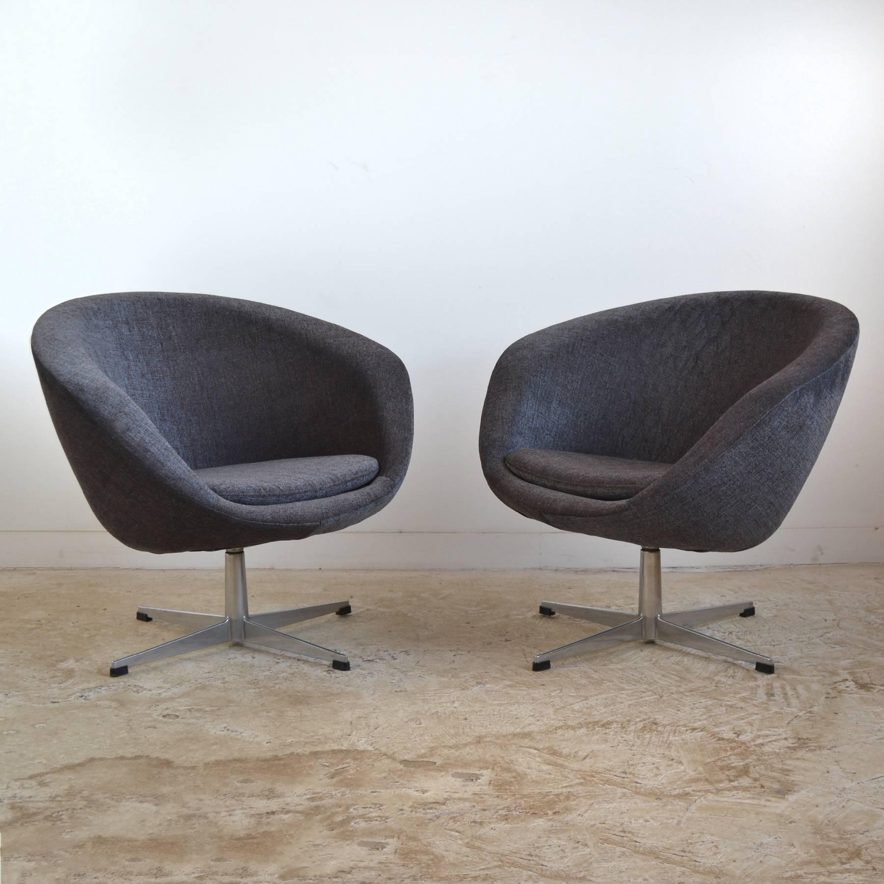 These two lounge chairs designed by Carl Eric Klote for his company Overman obviously take design cues from Arne Jacobsen's swan and egg chairs with their sculptural bodies perched atop four star pedestal bases. Overman designs are noteworthy for