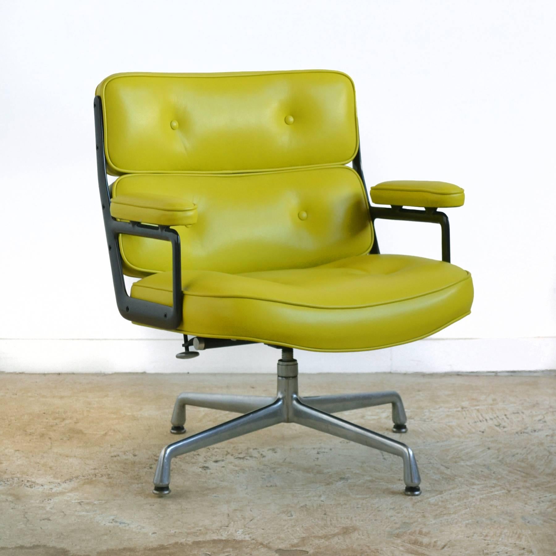 This Classic time-life chair by Charles and Ray Eames has been given a makeover with wonderful vivid green leather upholstery. Originally conceived as an easy chair for the reception area of the Time-Life building, the design soon became a favorite